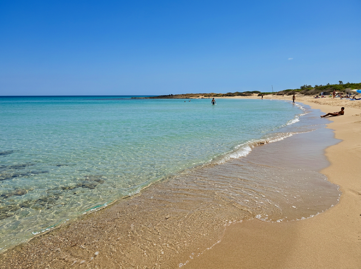 Sandy beach and clear Adriatic water in Torre Guaceto nature reserve, Puglia