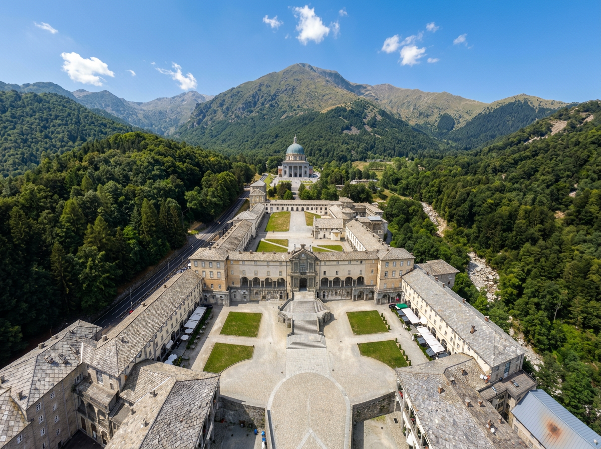 Courtyards and domed basilica of the Sanctuary of Oropa beneath the mountains near Biella