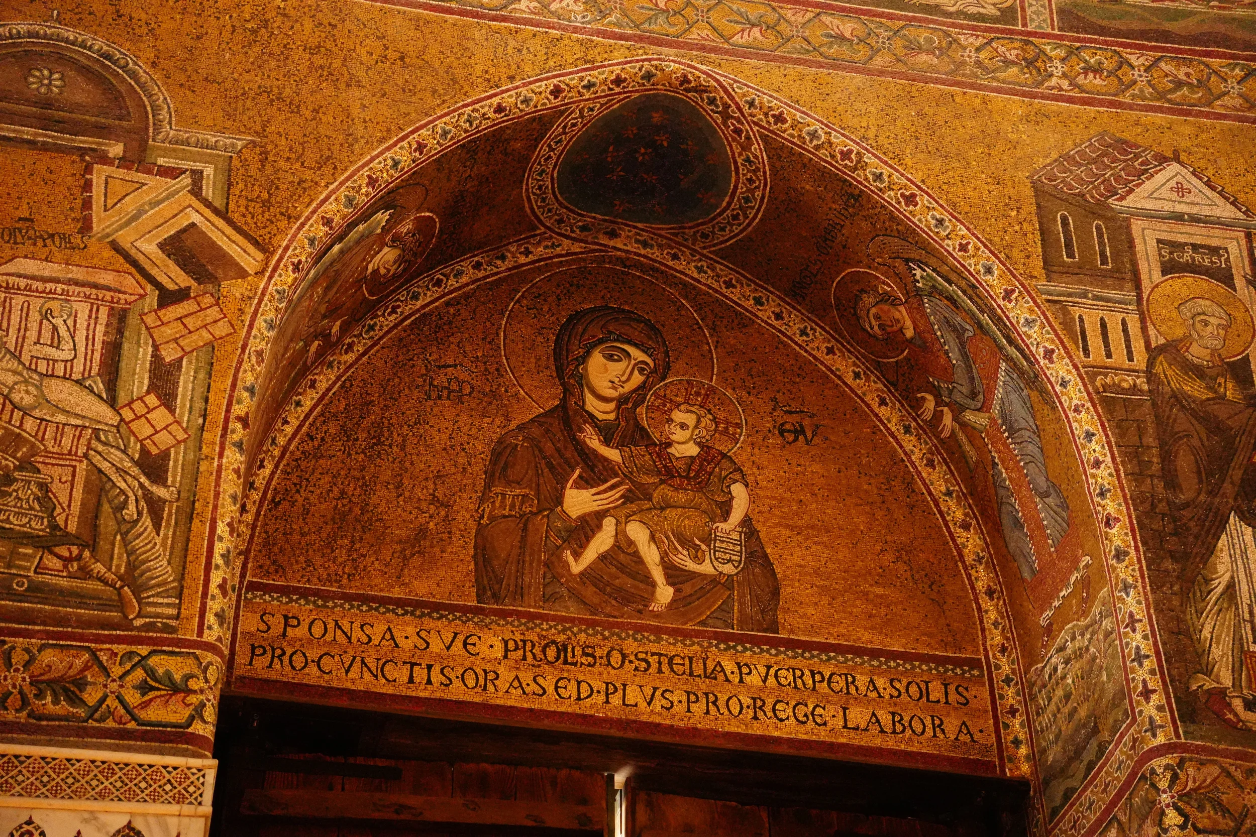 Golden Byzantine mosaics inside a historic monument in Ravenna