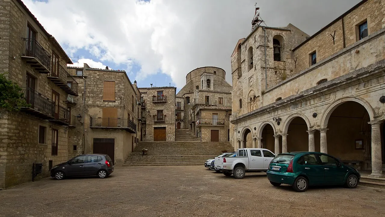 Piazza Duomo in Petralia Soprana, with stone steps and the arched portico of the Church of Saints Peter and Paul