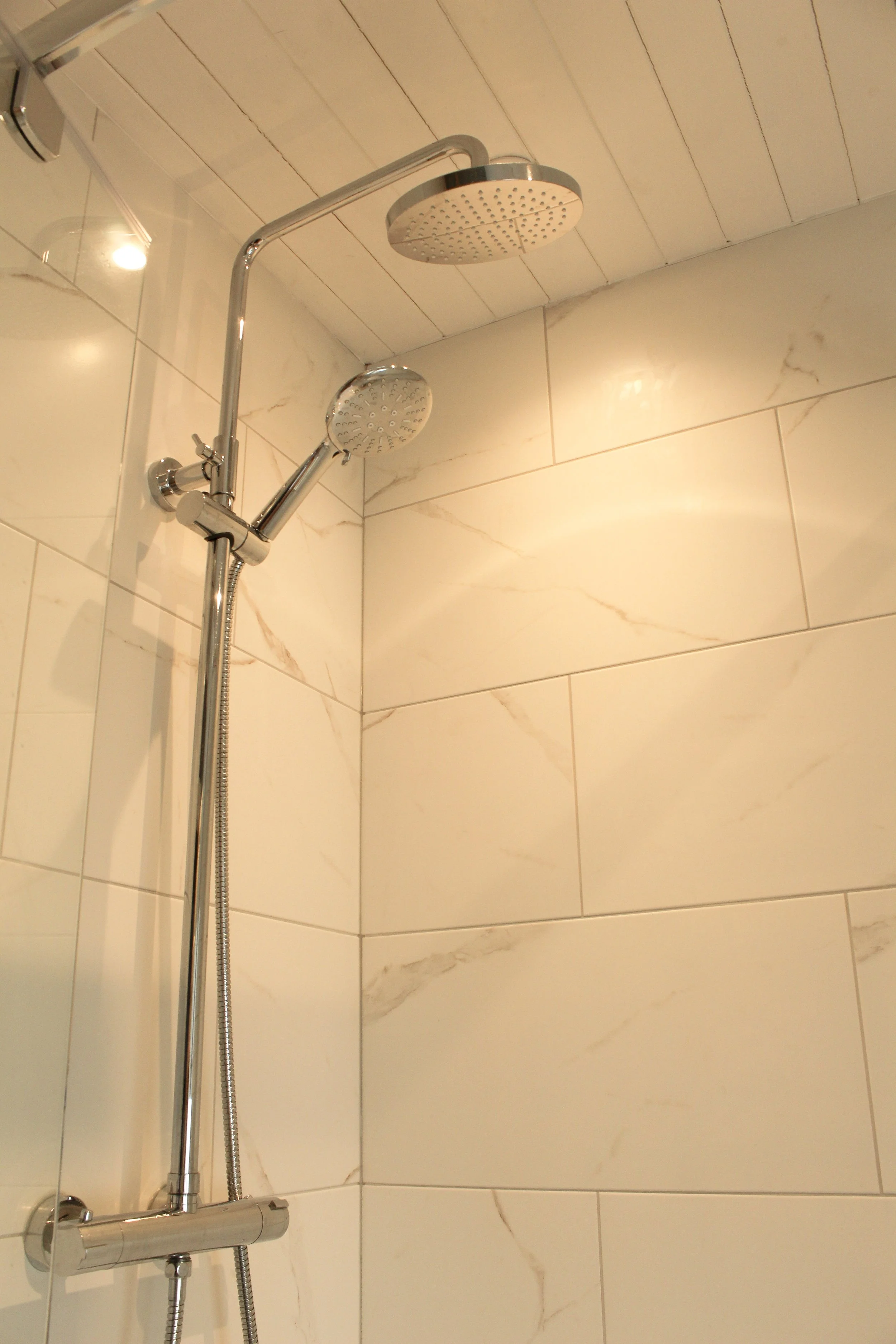 New shower with warm lighting