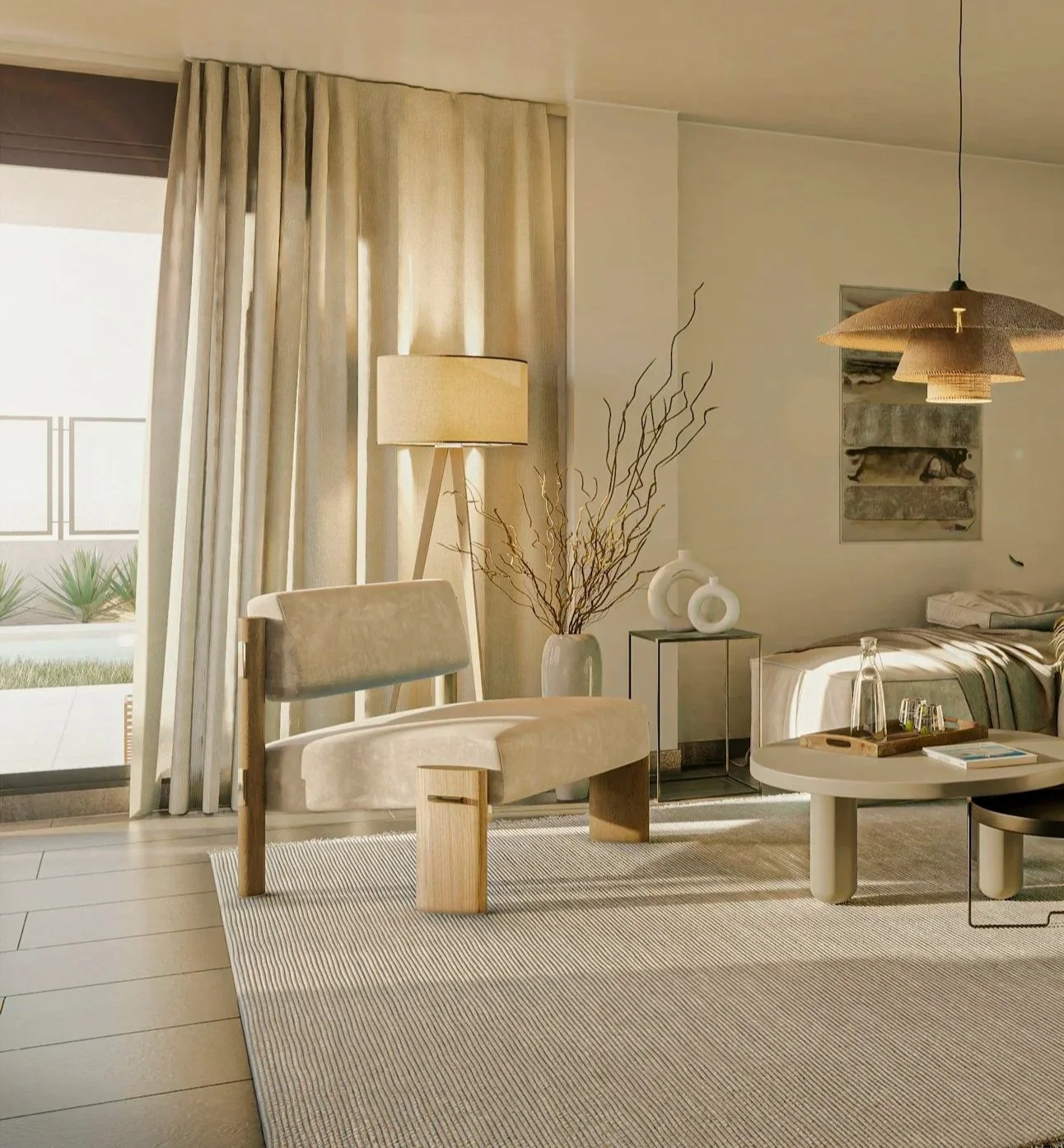 Living room with beige chair, floor lamp, decorative branches, and a round coffee table with glasses and bottles, next to a bed with striped bedding, large window with curtains.