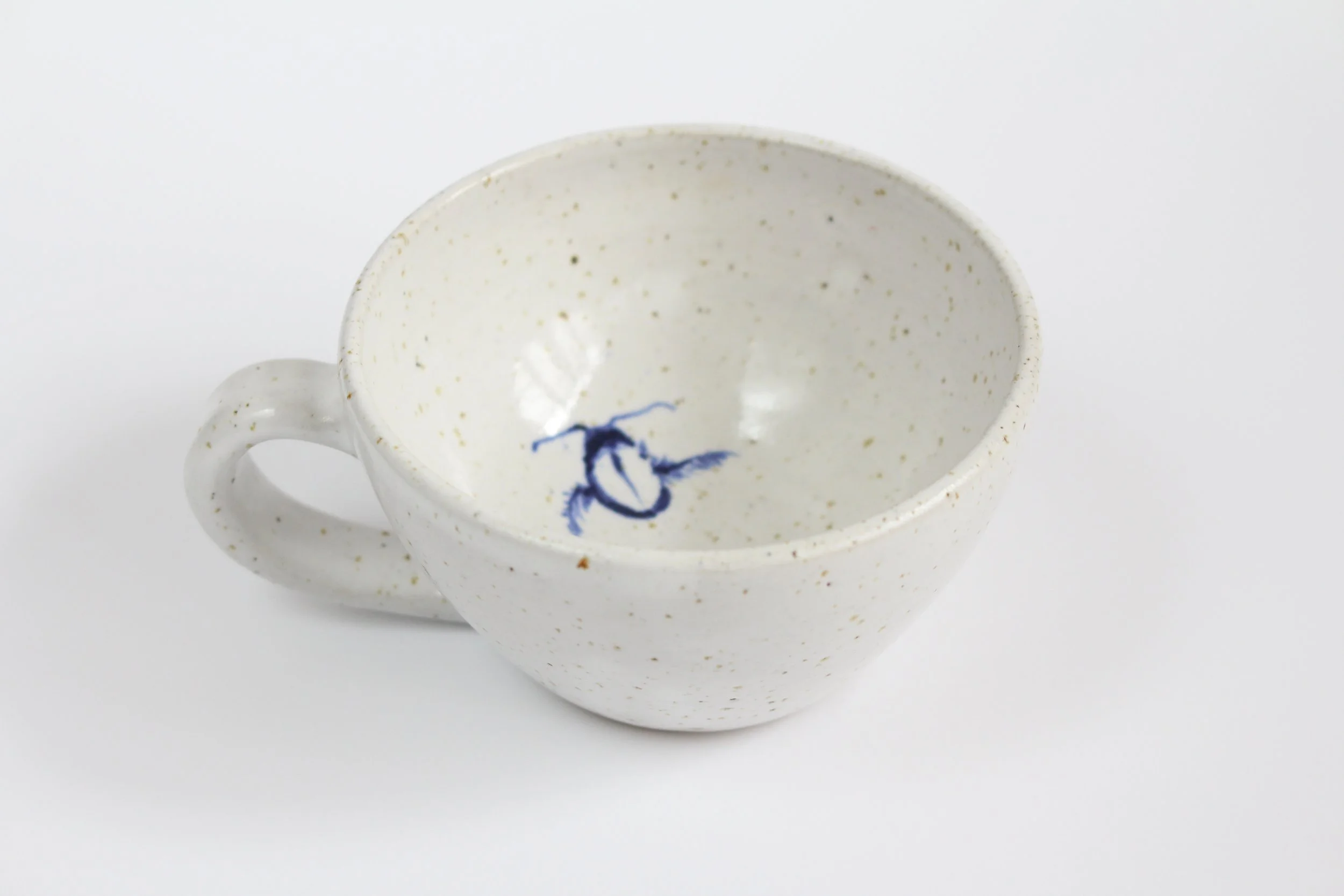 Small cup with water beetle