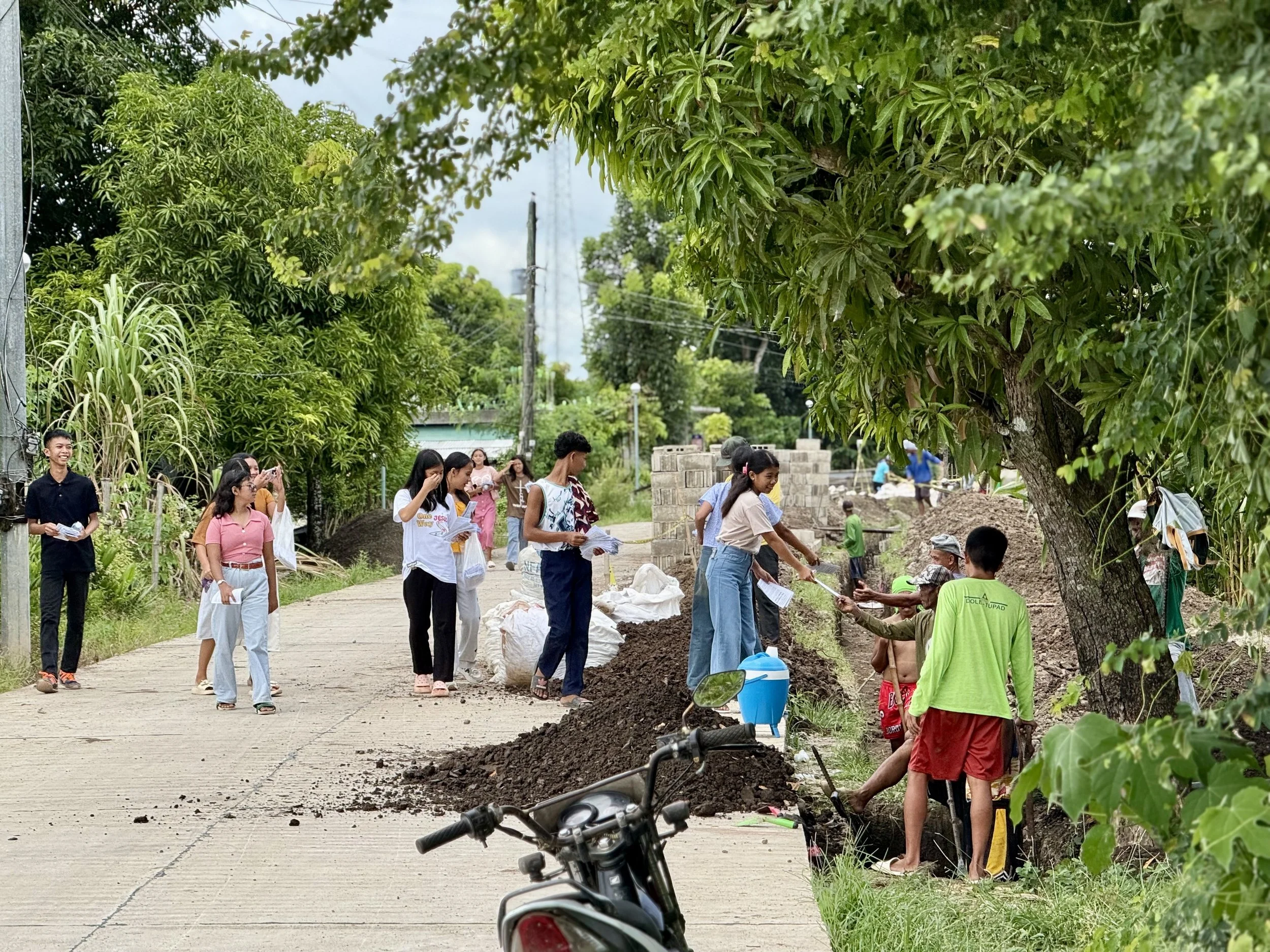 Brethren distributing tracts