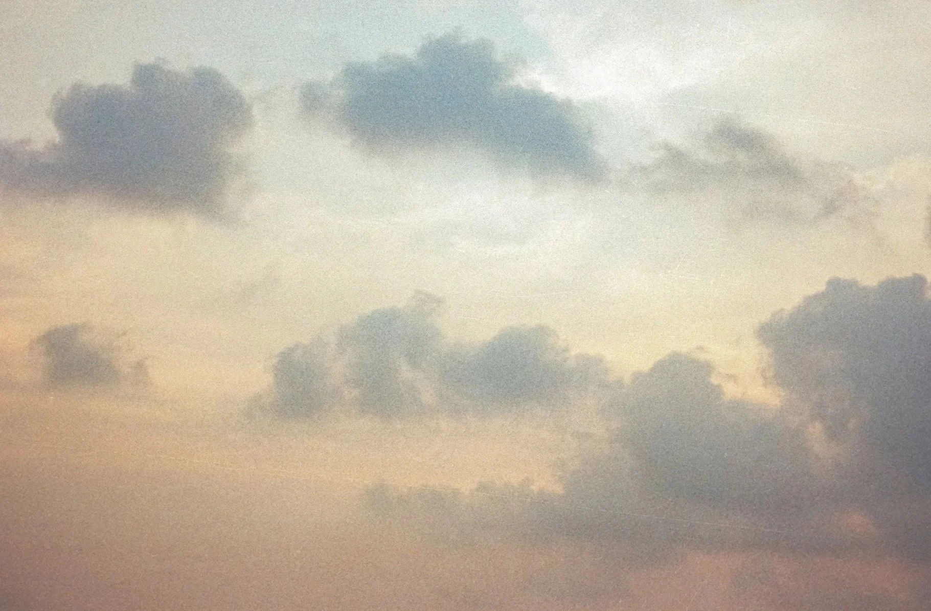 Sky with clouds during sunset or sunrise.