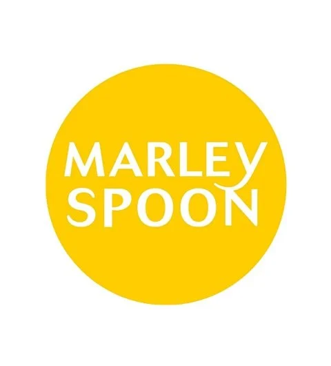 Logo for Marley Spoon; a yellow circle with the text 'Marley Spoon' in white capital letters.