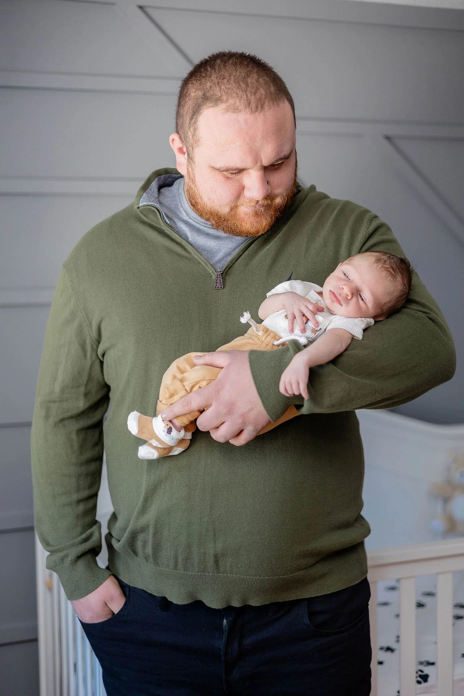 In-Home-Newborn-Family-Photos-Dad-Baby.jpg
