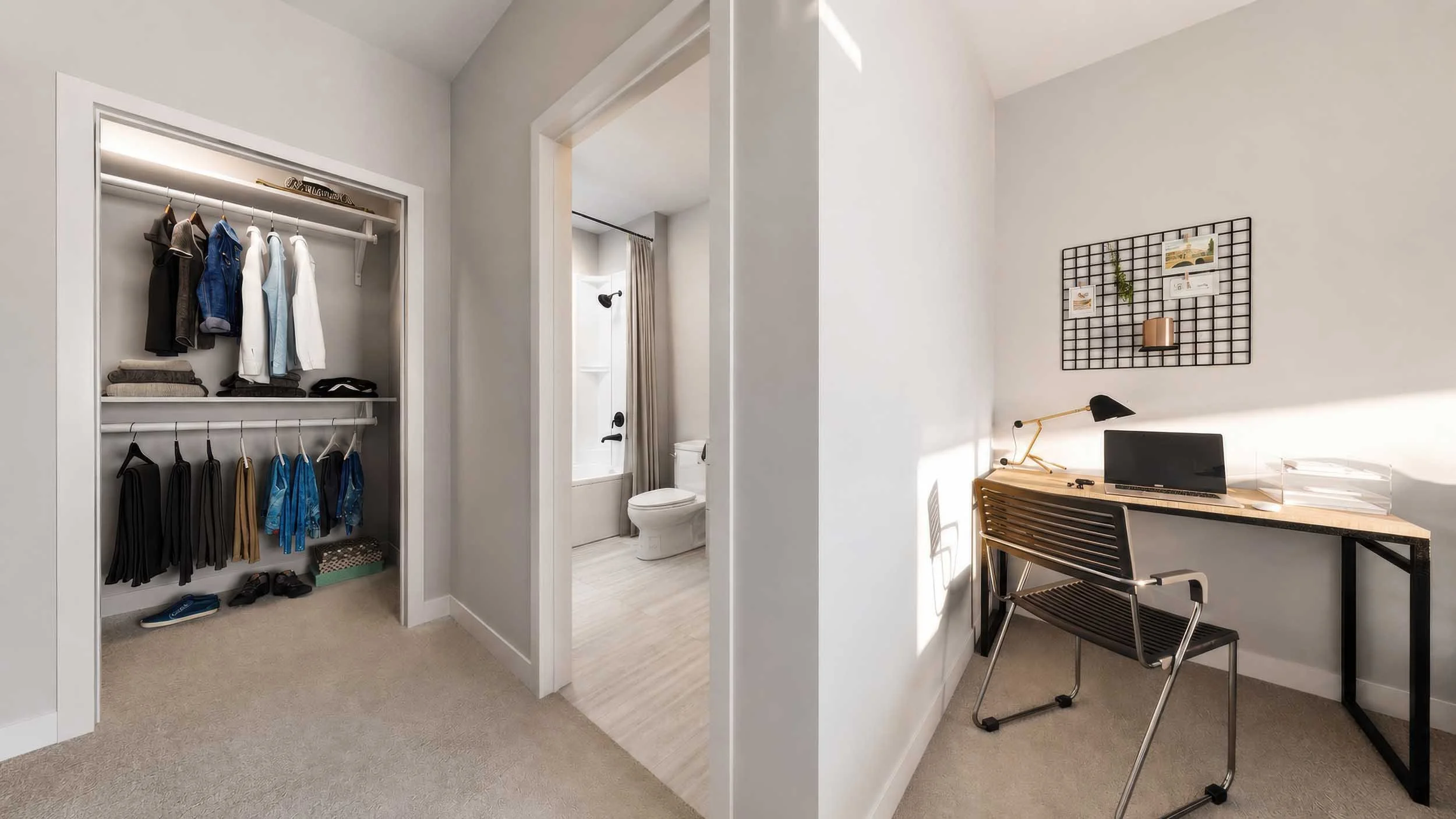 A bedroom with an open closet containing hanging clothes and shoes, a bathroom with a bathtub and toilet, and a workspace with a desk, laptop, and wall grid with photos, all with natural light and white walls.