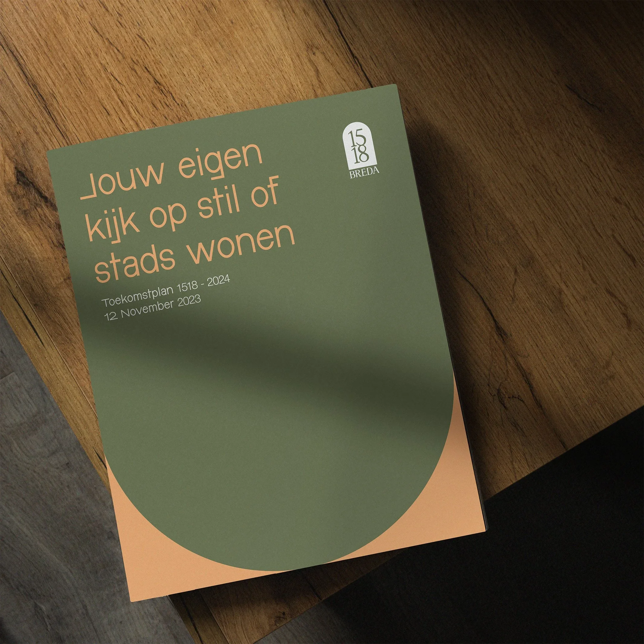 Colorful paper sheets with some text on a wooden table. BigStoryShort client.