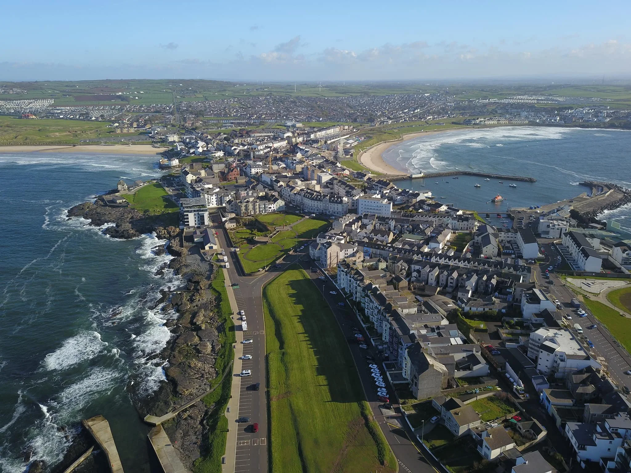 Located in the centre of the photo at the corner of the first green, with stunning views over the wild Atlantic, Giant's Causeway, Dunluce Castle and the Skerrie Islands.
