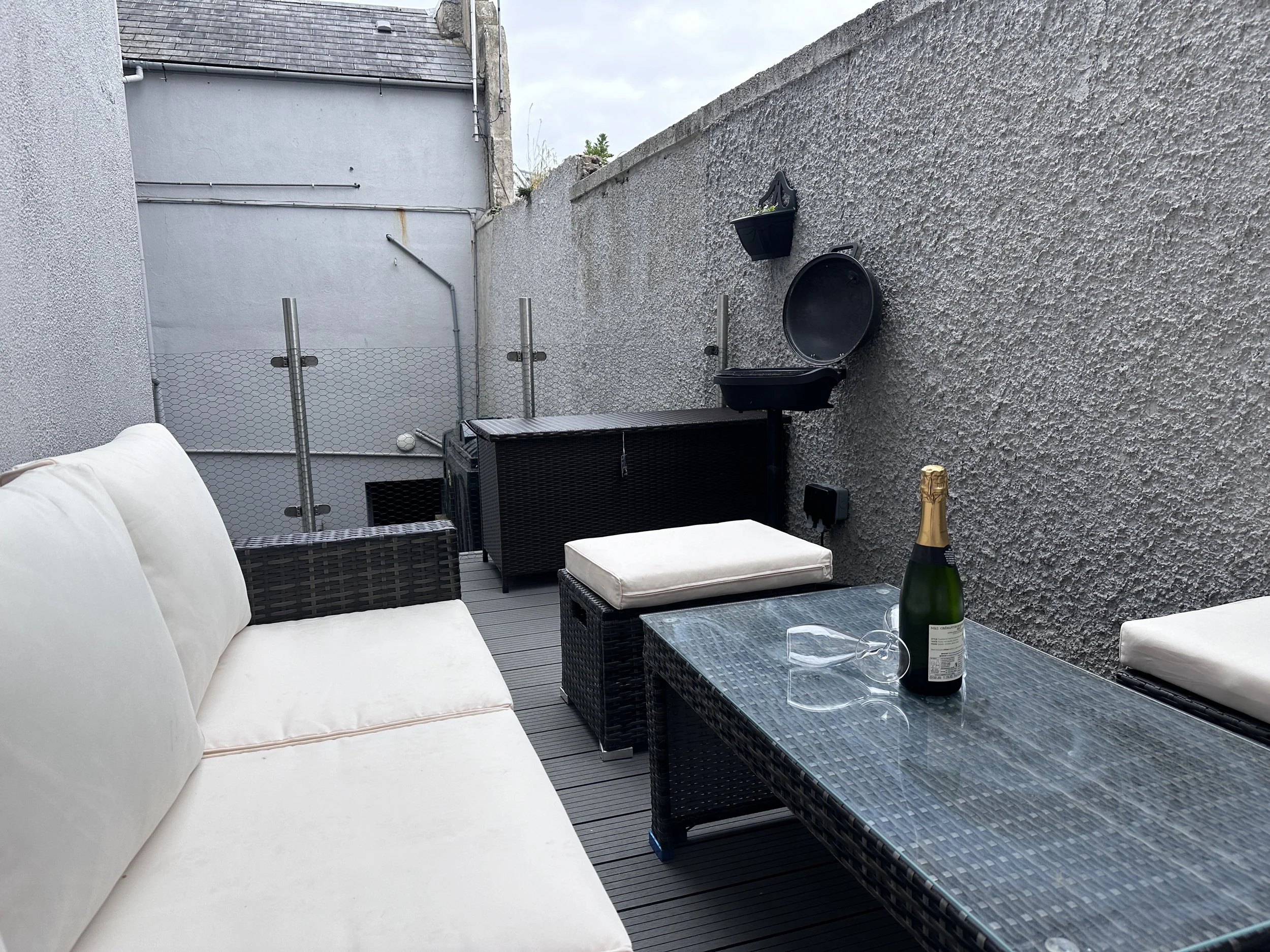 Outdoor deck, catches the sun from late morning until late afternoon. Sadly no view. 