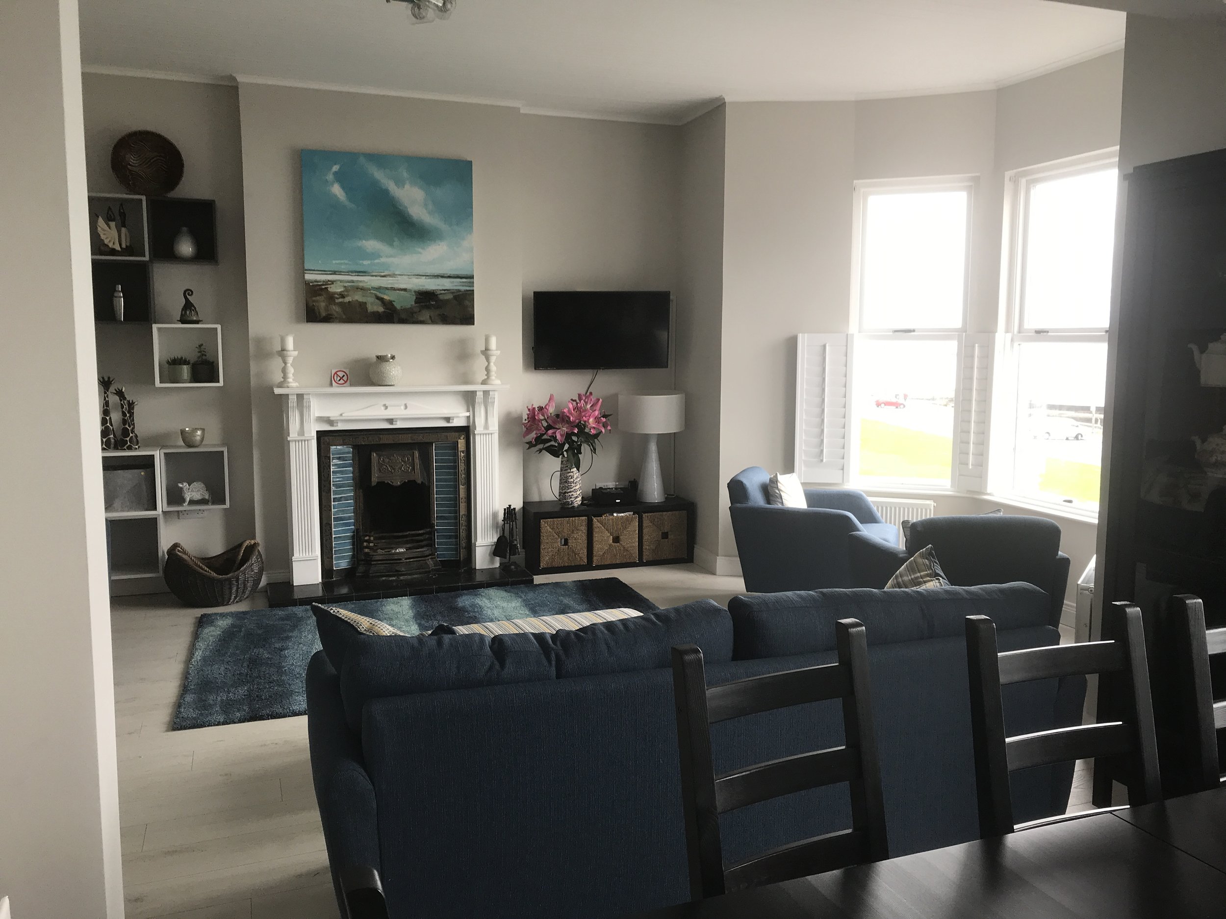 LIVING ROOM FROM 8 SEATER DINING AREA