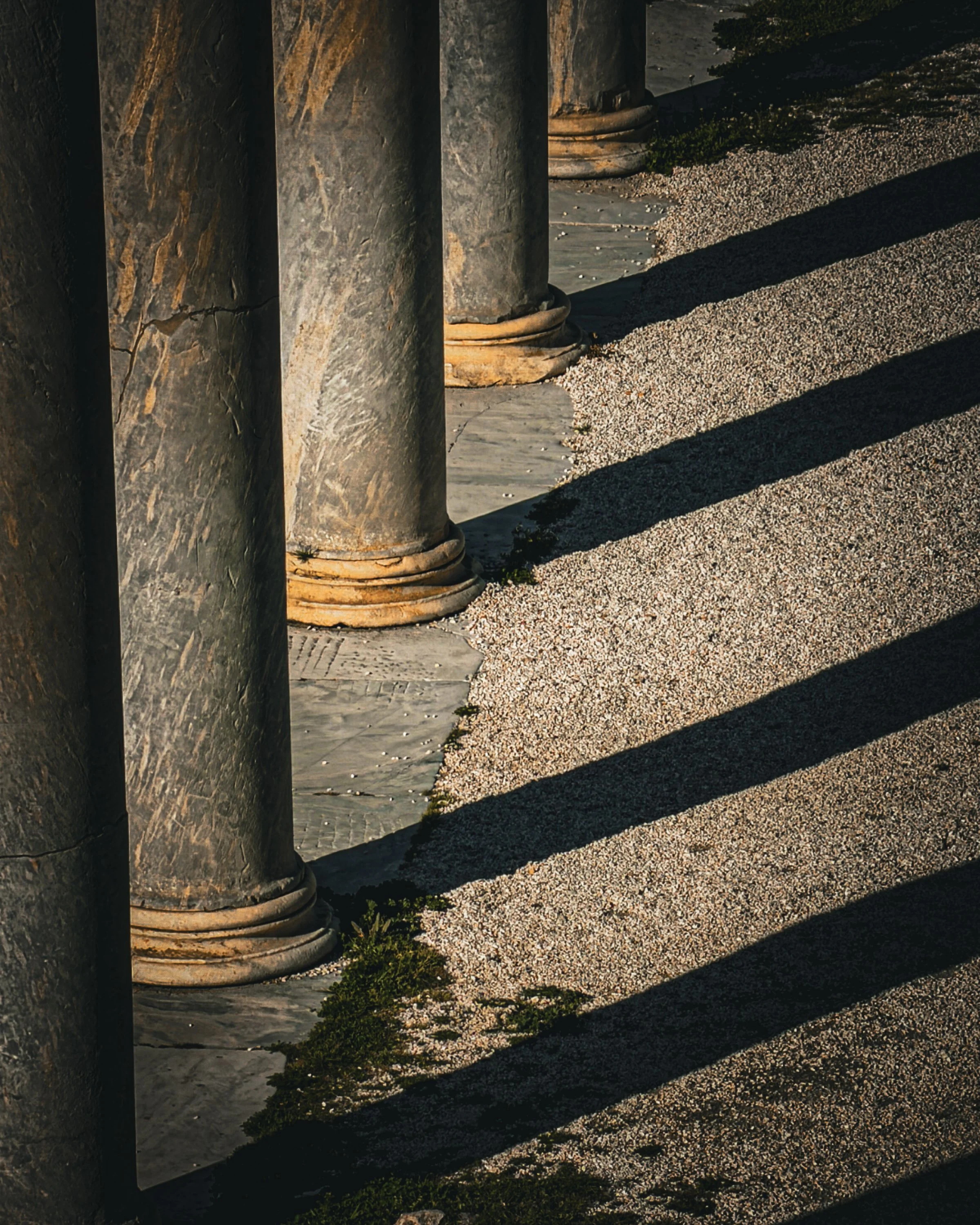 Classical columns with striped shadow geometry.jpg