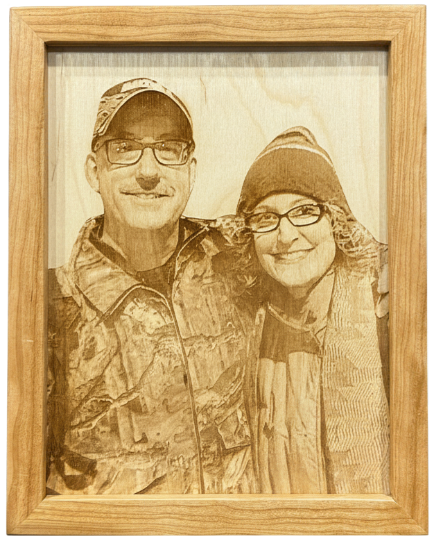 Large framed laser-engraved portrait of a husband and wife.