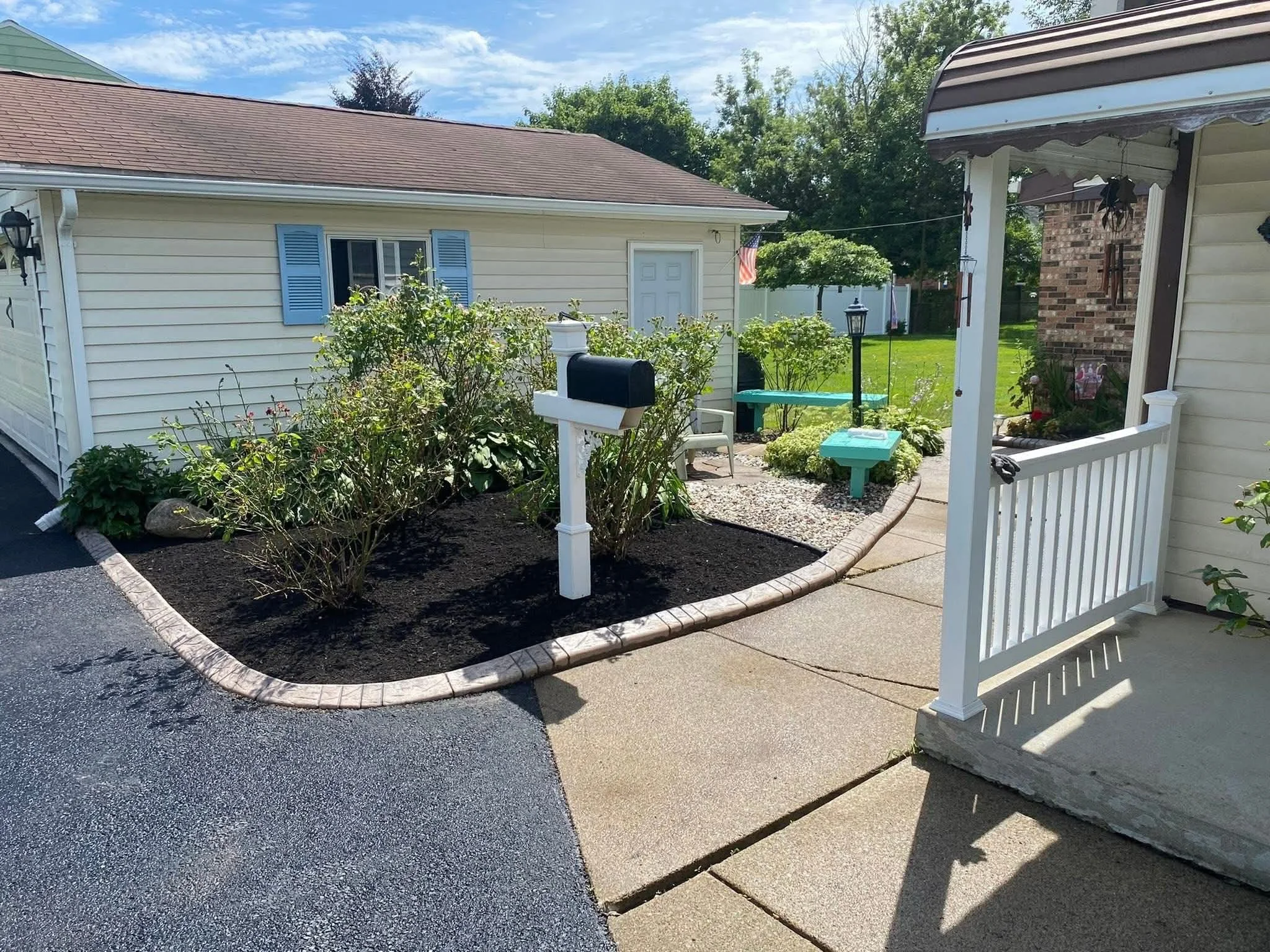 New landscape and mulching by CPM Chris' Property Maintenance Inc. in Niagara Falls NY