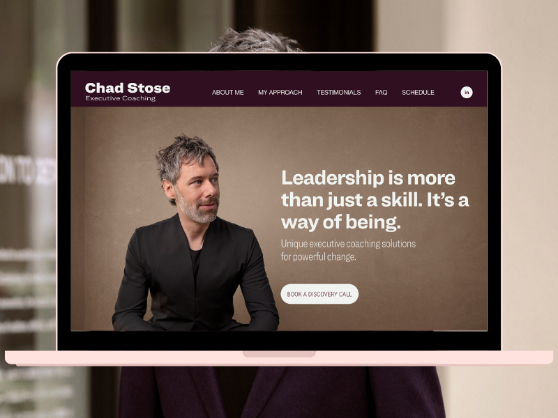 Screenshot of a coaching website for Chad Stose, featuring a man with gray hair and beard in a black jacket, with a brown background and navigation bar at the top. Text promotes leadership coaching services.