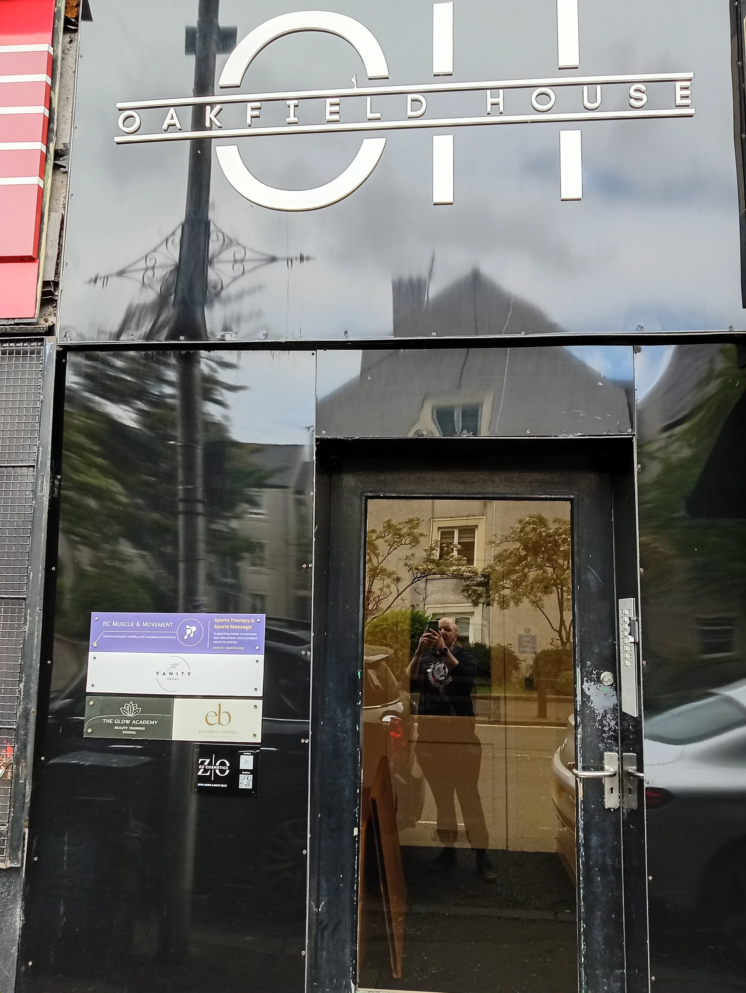 zoomed image of oakfield house business centre sign where rc muscle and movement clinic is located