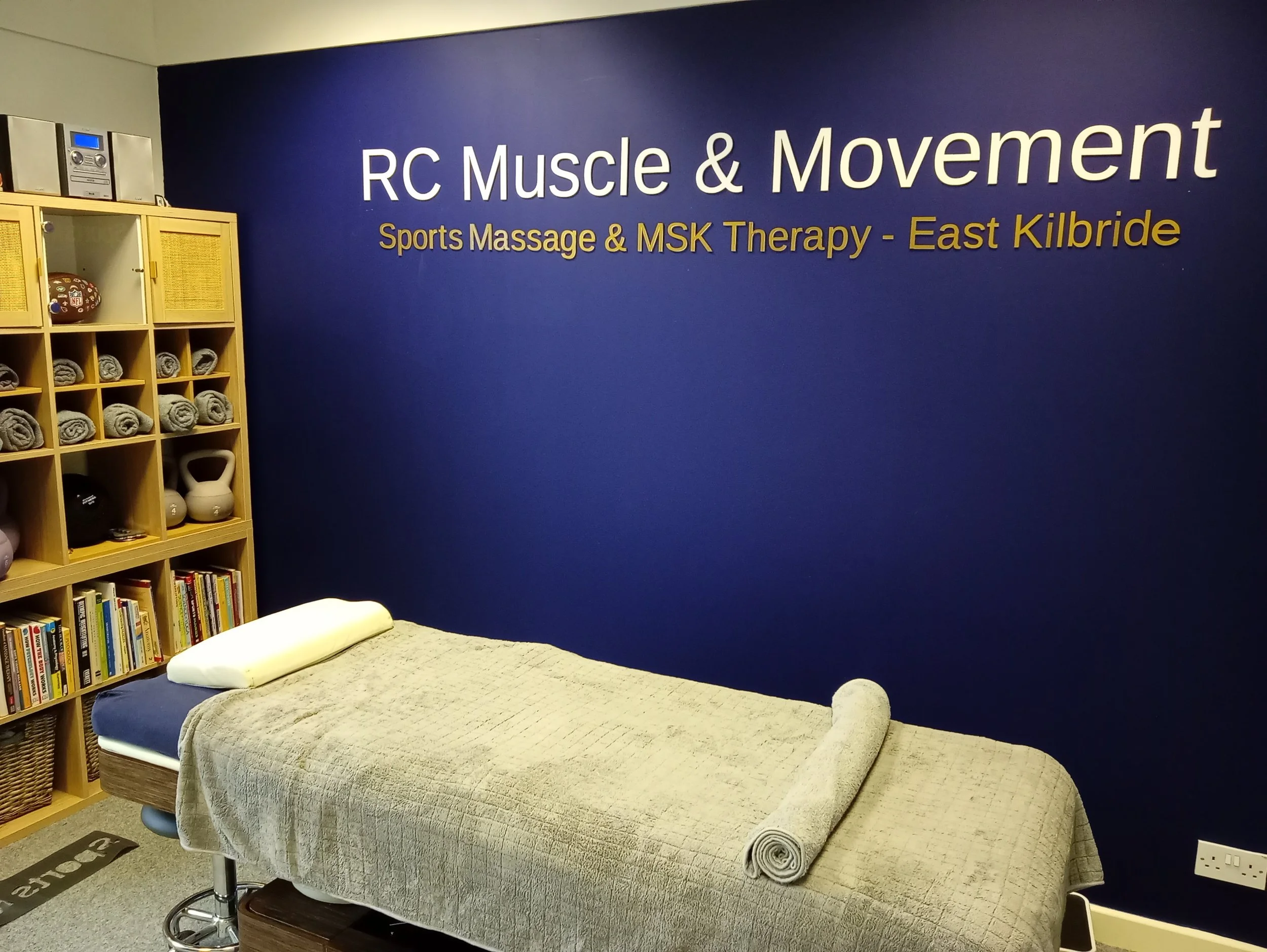 rcmm clinic room with massage bed and equipment to help with recovery