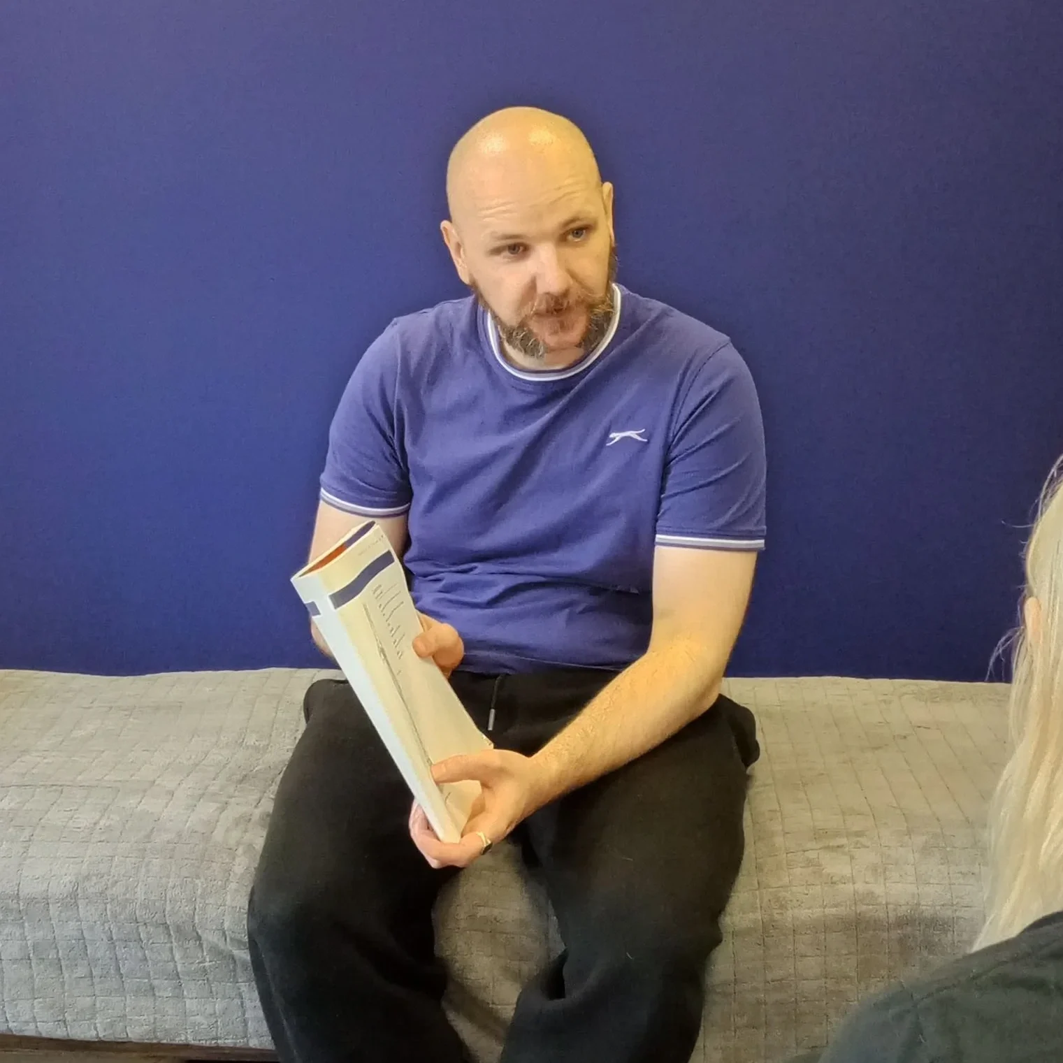 Ross Canning explaining treatment in the RC Muscle & Movement clinic