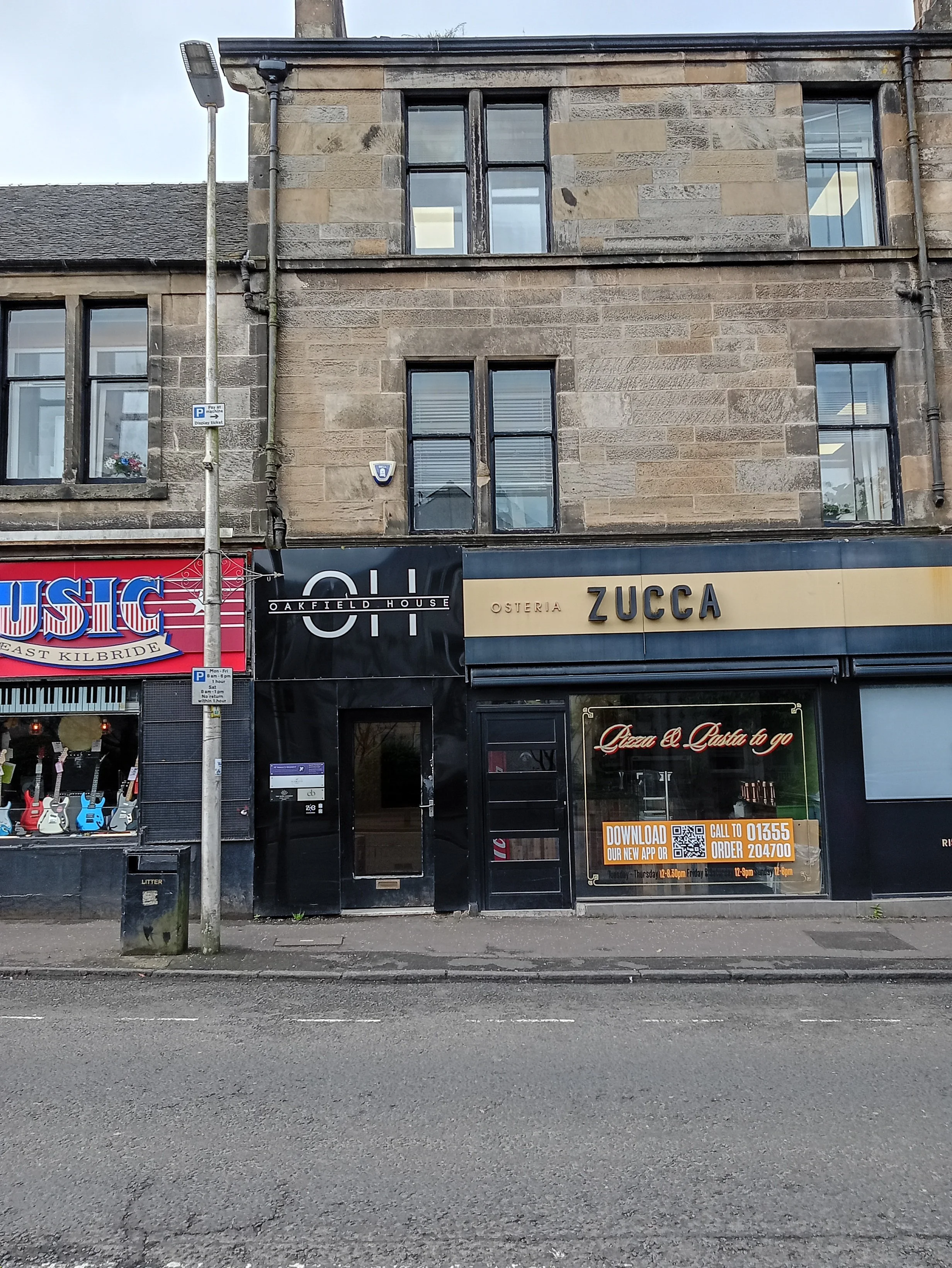 across the street image of oakfield house business centre in east kilbride village where RC Muscle & Movement Clinic based