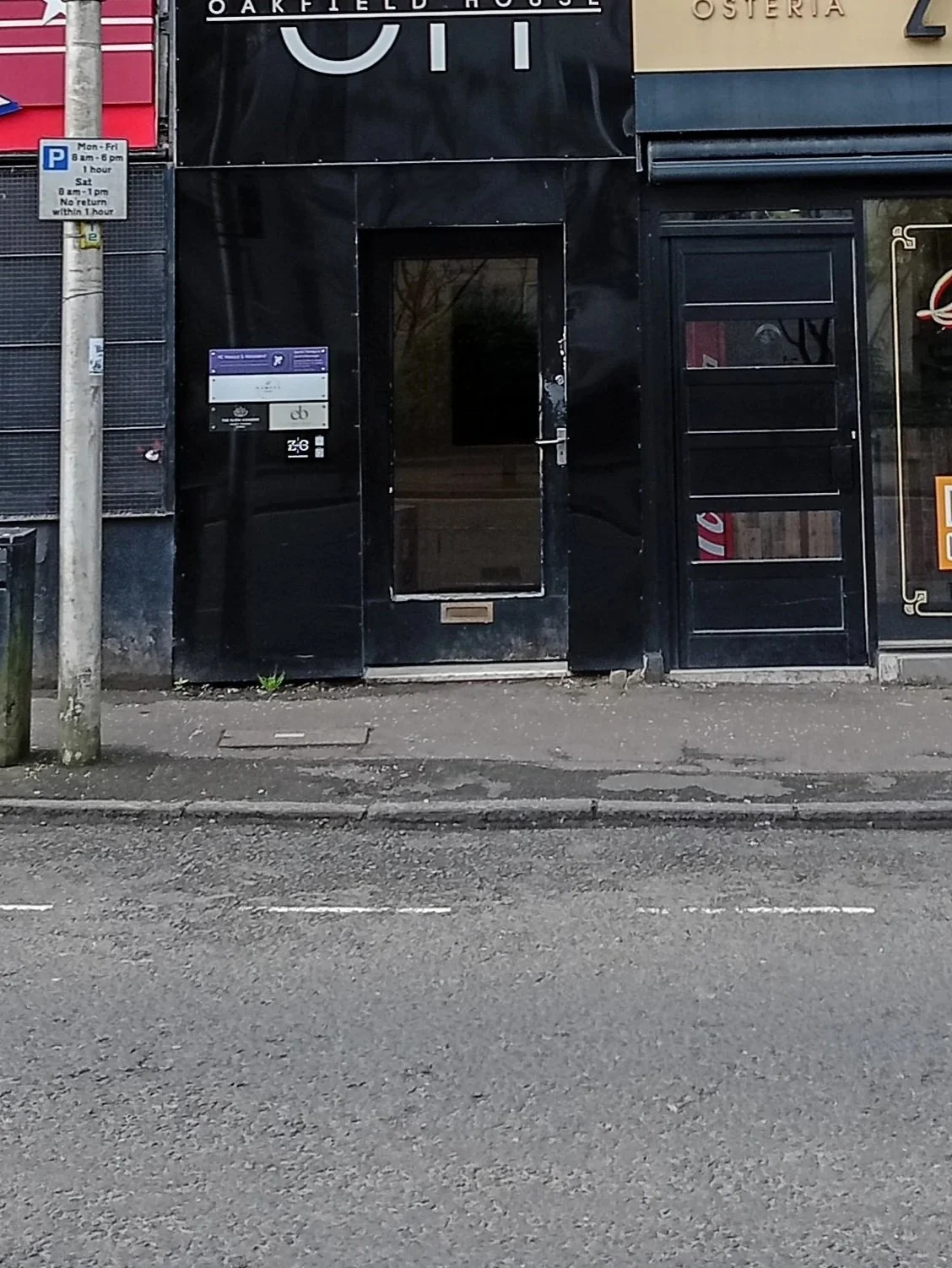 closer image of oakfield house business centre showing parking space outside