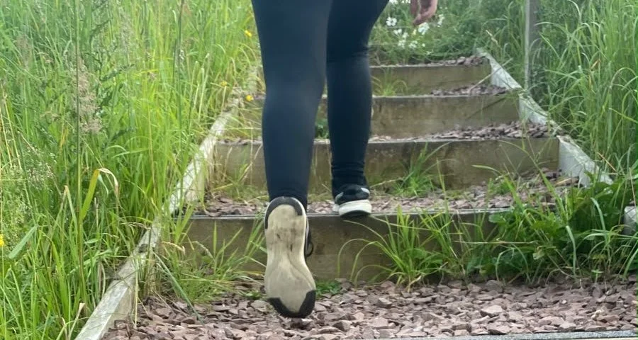 paula walking up stairs