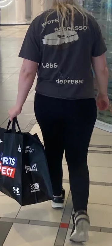 paula walking with shopping showing everyday movement and impact on back
