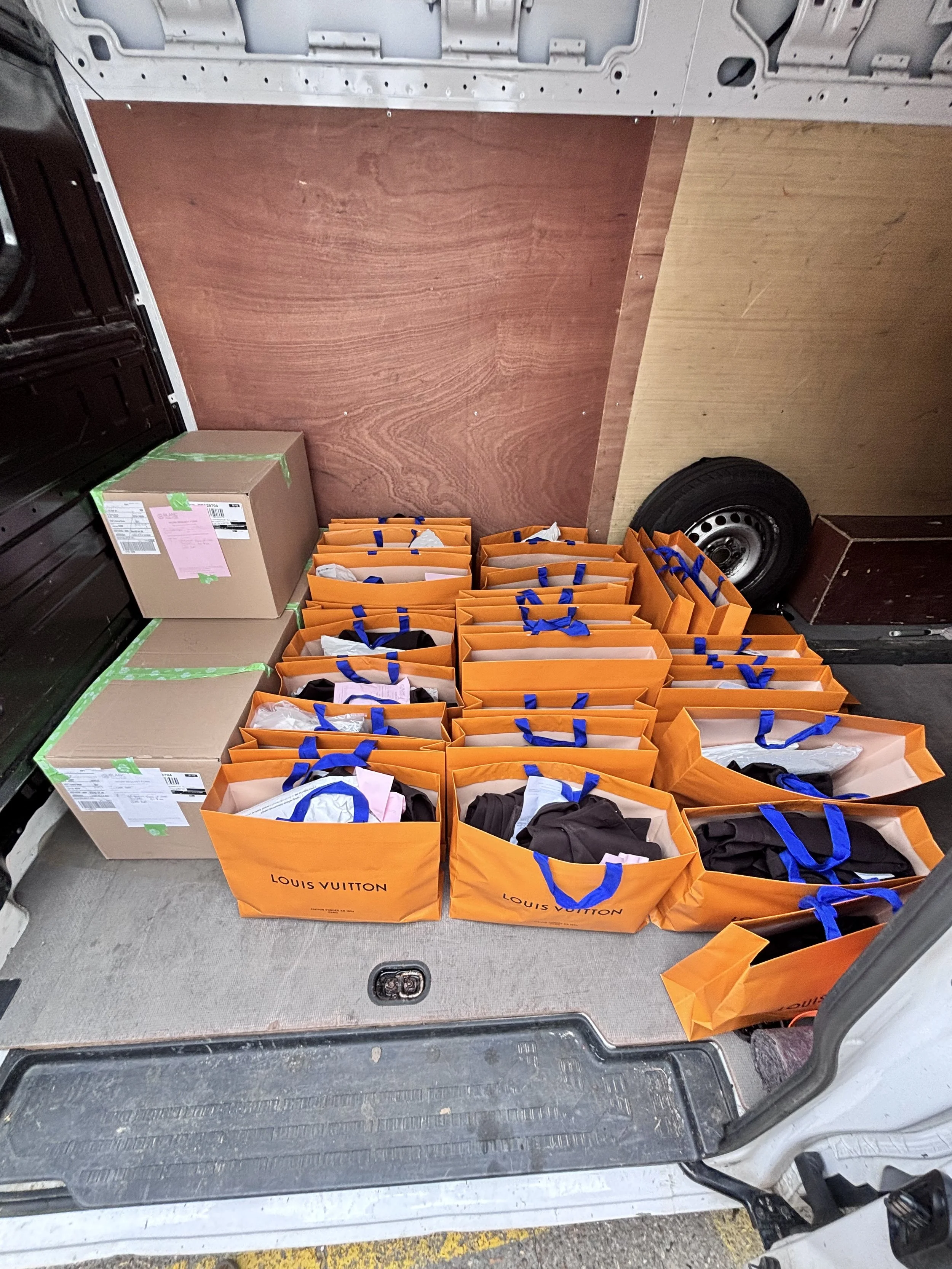 Retail goods loaded for careful dedicated courier transport