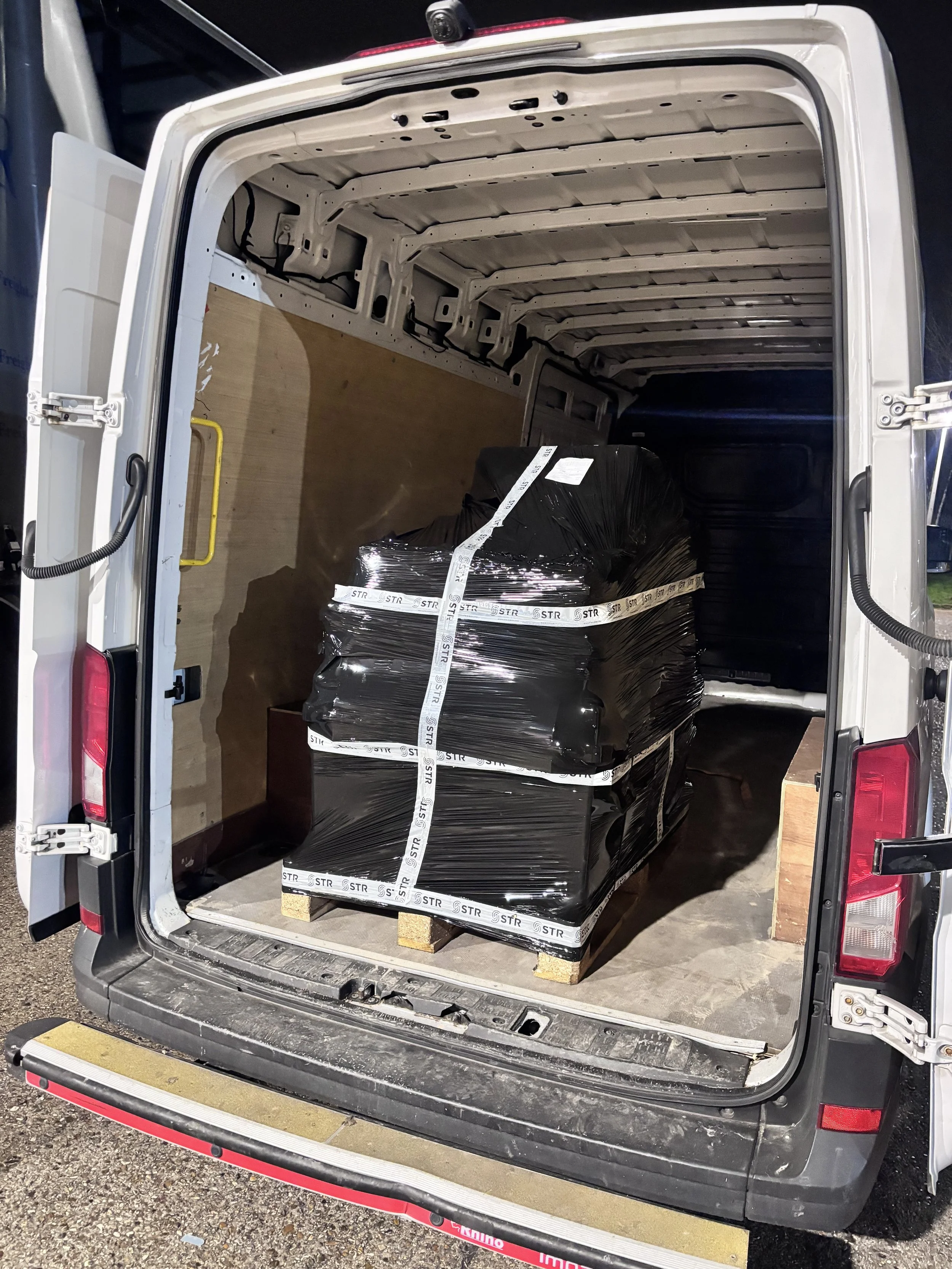 Wrapped pallet load in van