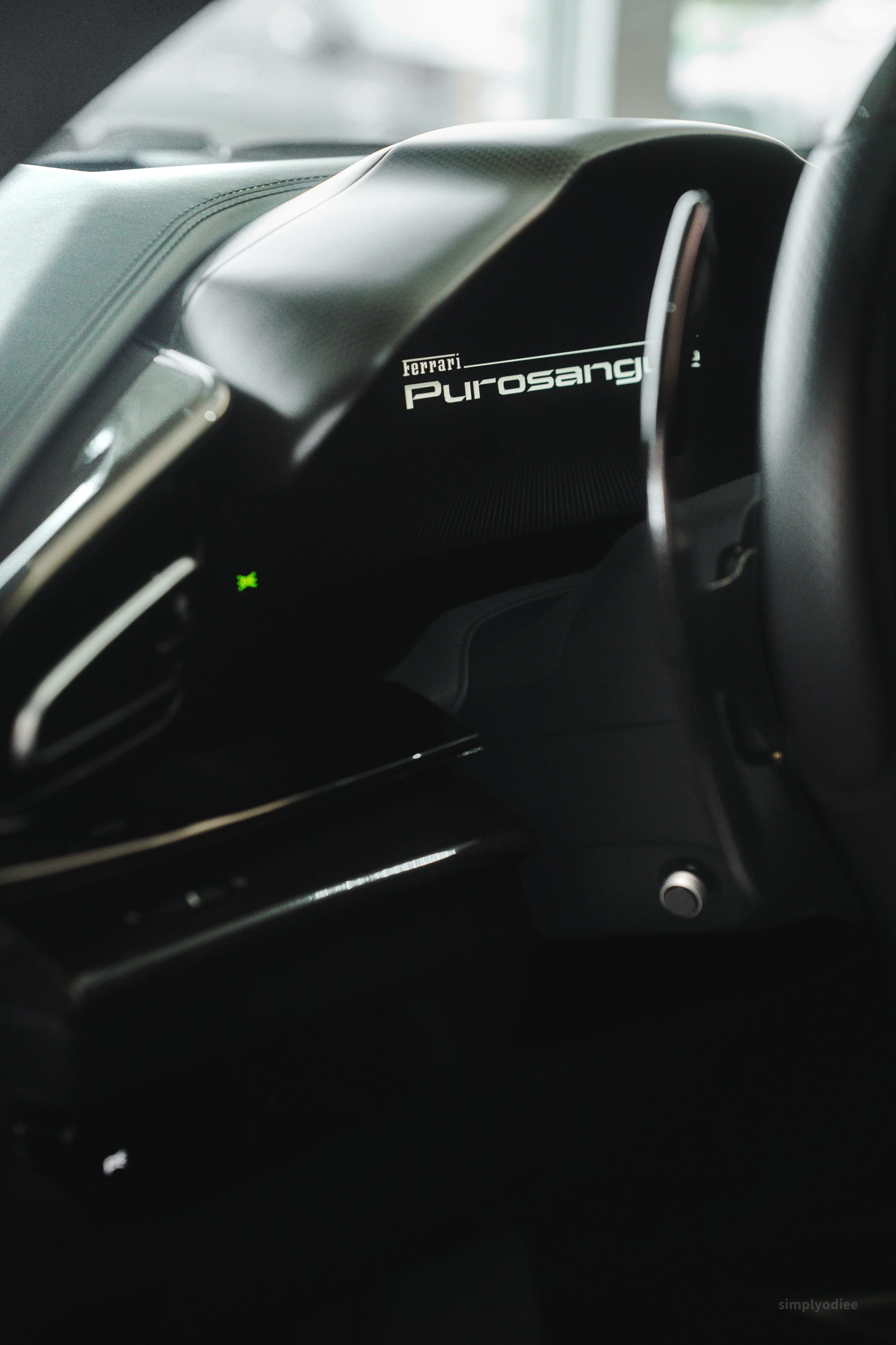 Dashboard of a Ferrari Purosangue with the brand logo visible.