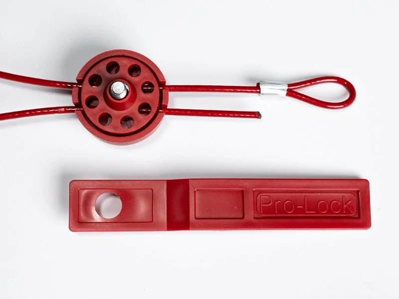 A red Pro-Lock cable lock with a looped wire and a red lock mechanism on a white background.