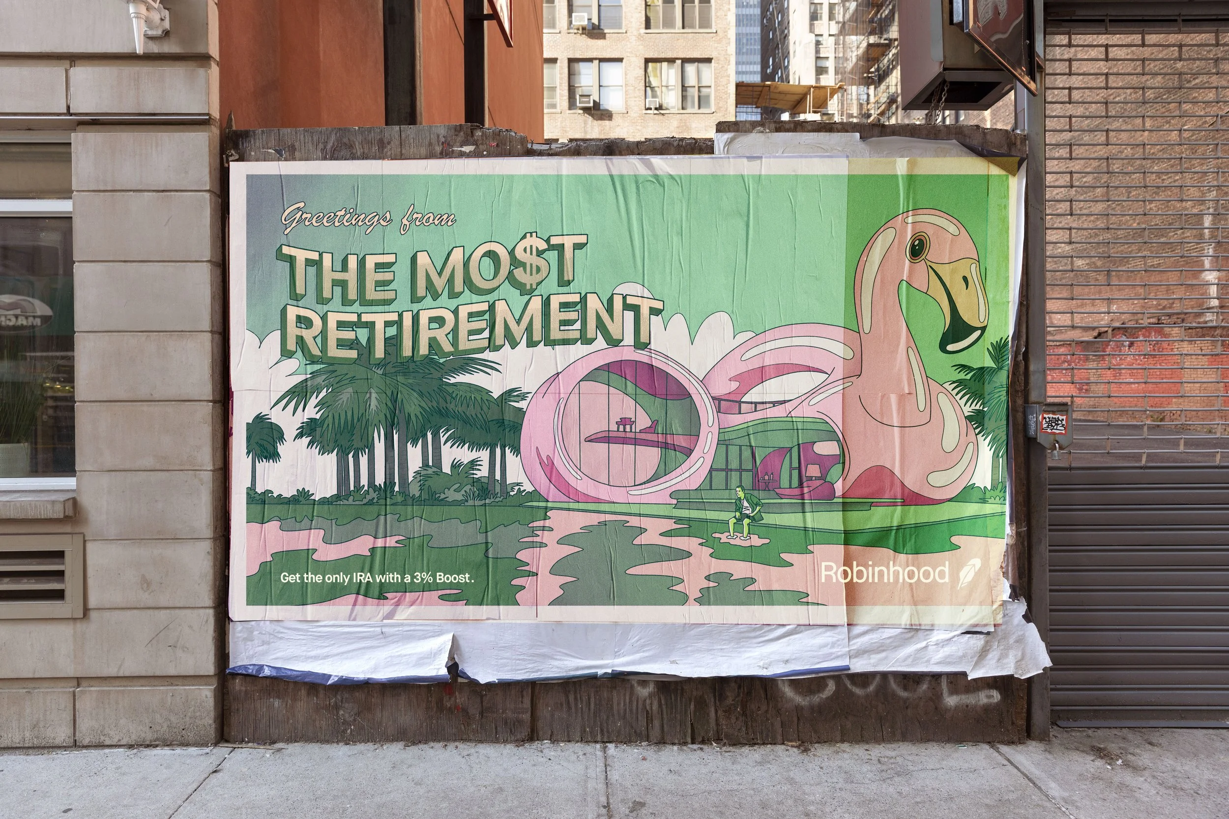A colorful poster on a brick wall that reads 'Greetings from the Most Retirement' with a pink flamingo slide and lush trees. The poster promotes Robinhood and mentions an IRA with a 3% boost.