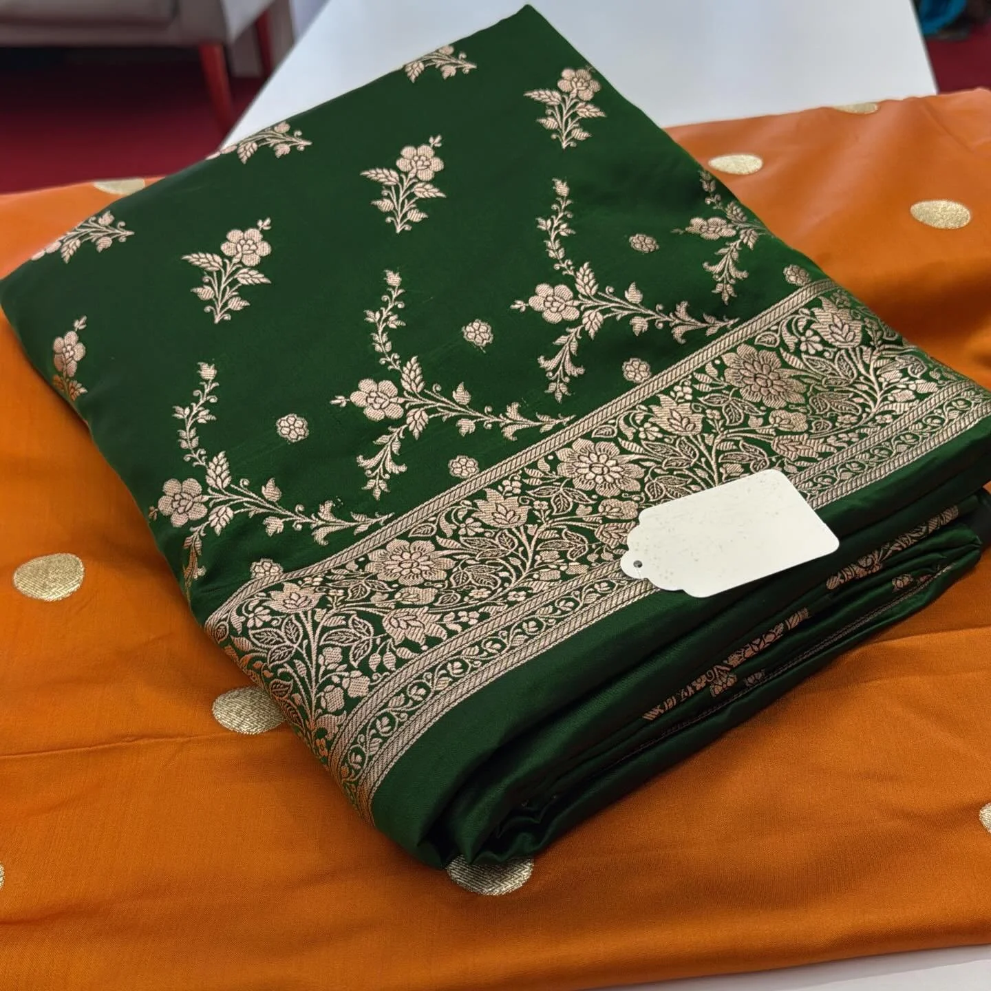 ✨ Elegance in every fold ✨

Rich emerald green silk paired with delicate gold zari work &mdash; this piece is all about timeless grace. The intricate floral detailing and classic border make it perfect for weddings, festive gatherings, or when you si