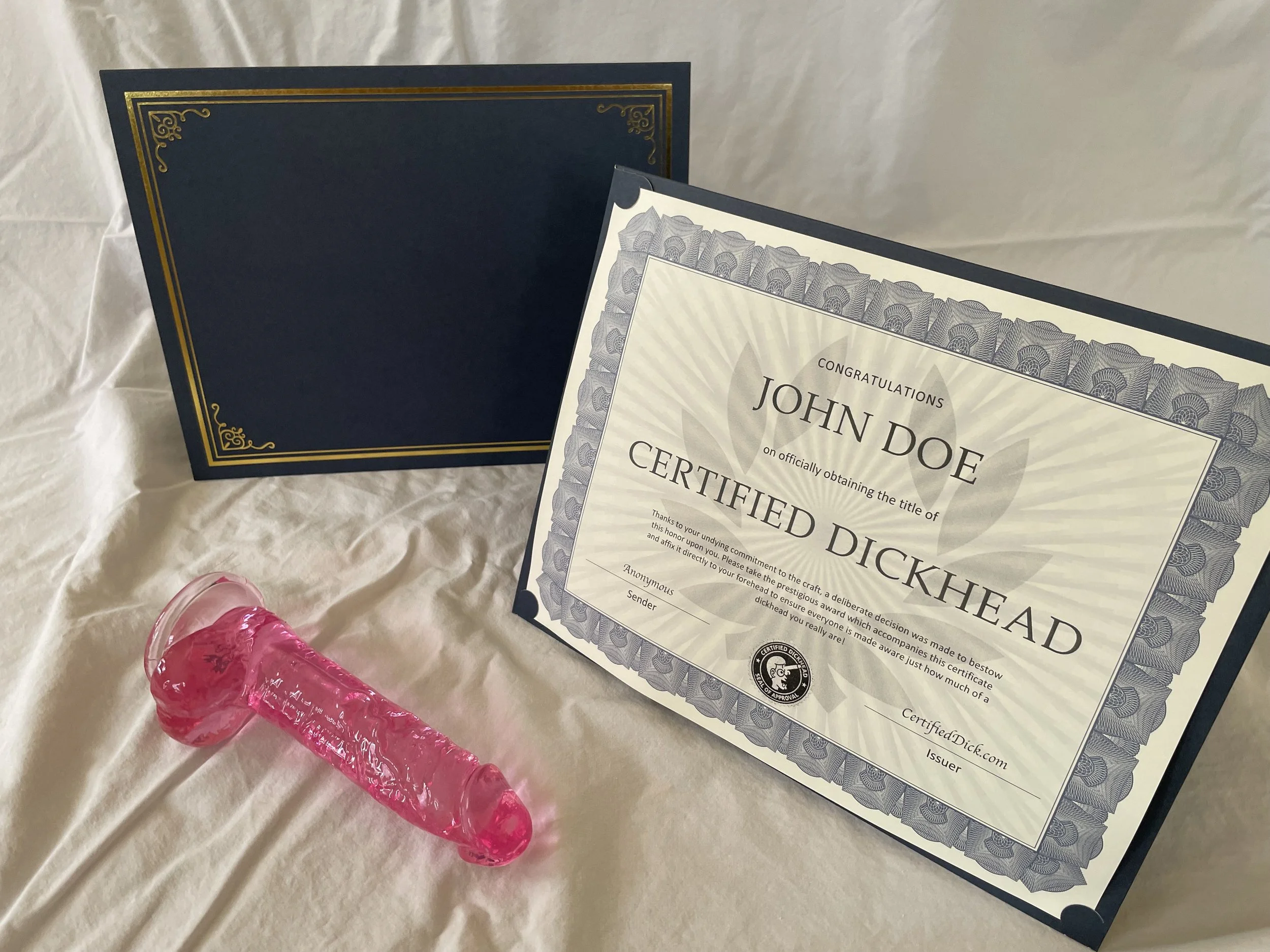 Dickhead Certification with Pink Dildo