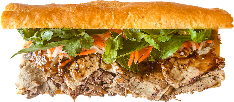 Close-up of Pho French Dip Banh Mi Boy sandwich.