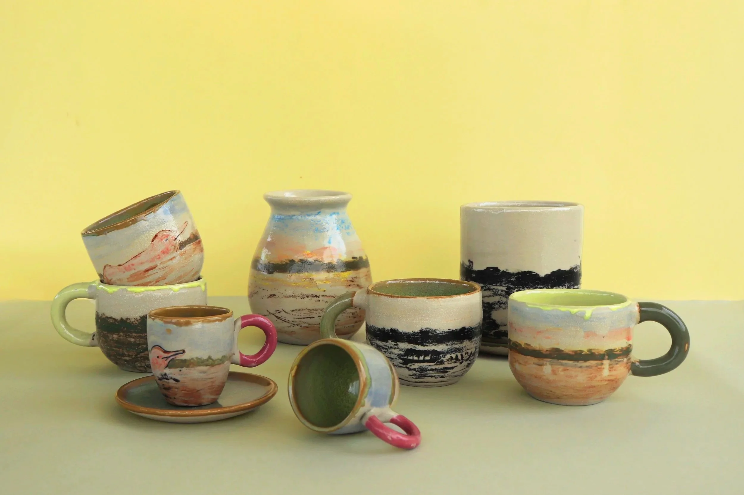 Collection of hand-built ceramic cups and plates created for DoubleTree by Hilton in Iquitos, inspired by Amazonian landscapes, river systems, native wildlife and organic forms.