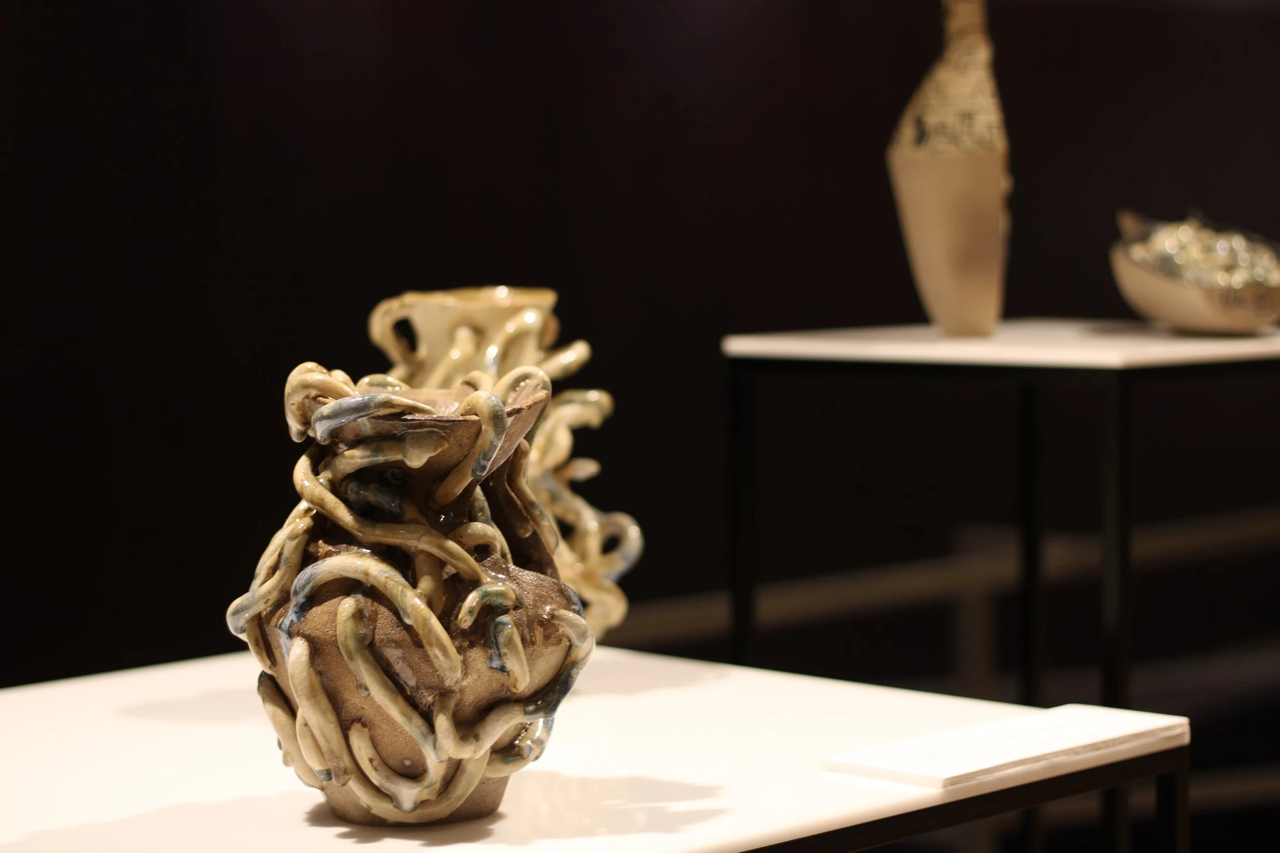 Installation view of Rituals de Resistència at  Barcelona, featuring hand-built ceramic sculpture Tipishka from the Atravesar Series.