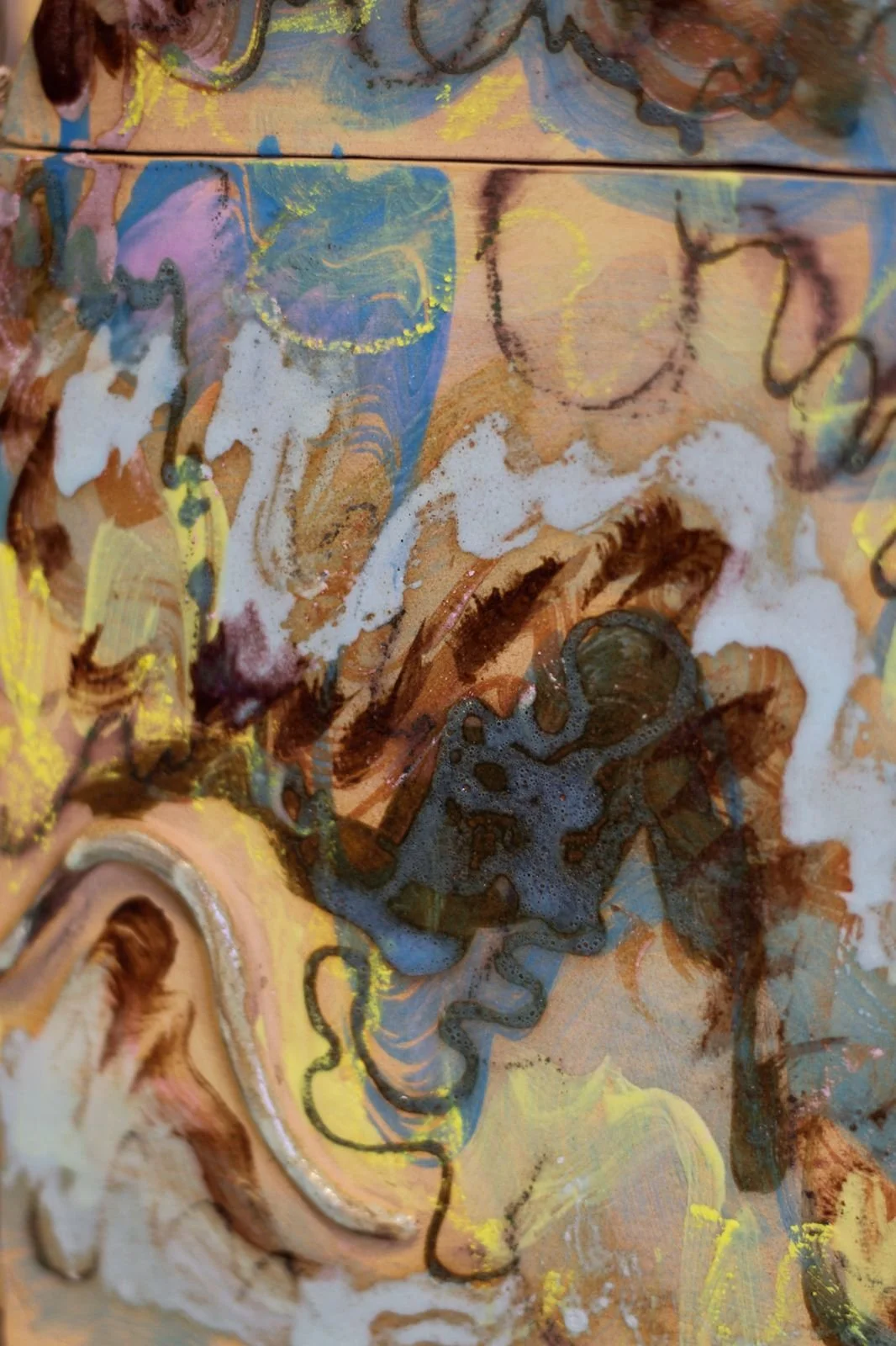 Detail of the hand-finished surface of a memorial ceramic urn commissioned by a private collector, featuring a custom colour palette and an integrated space for fresh flowers.