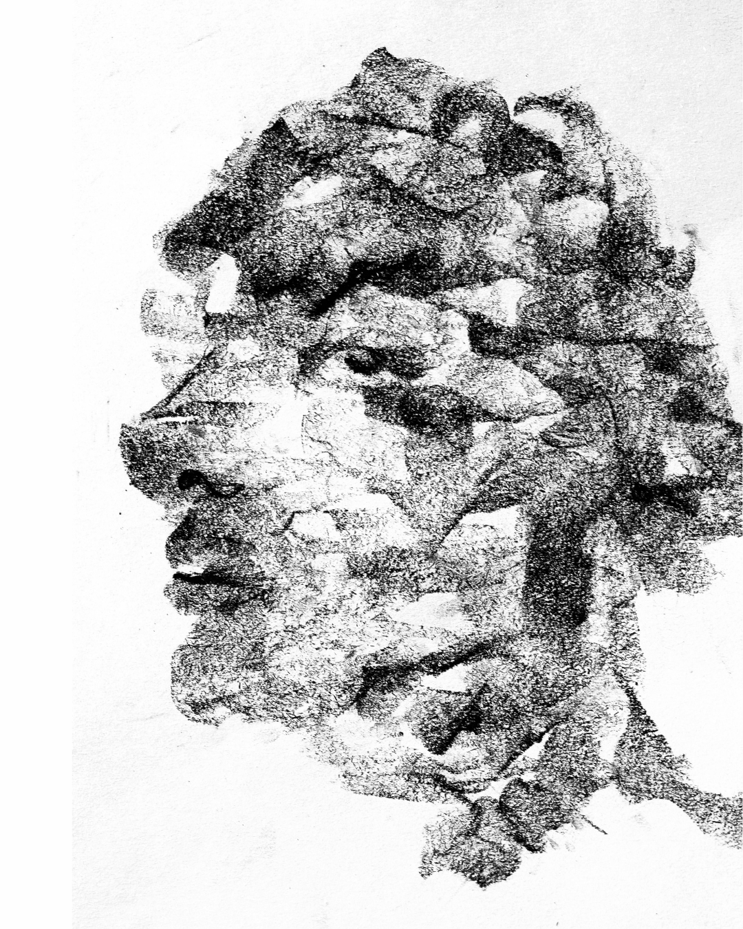 Charcoal drawing depicting an expressive face created with gestural charcoal lines and soft tonal shading.