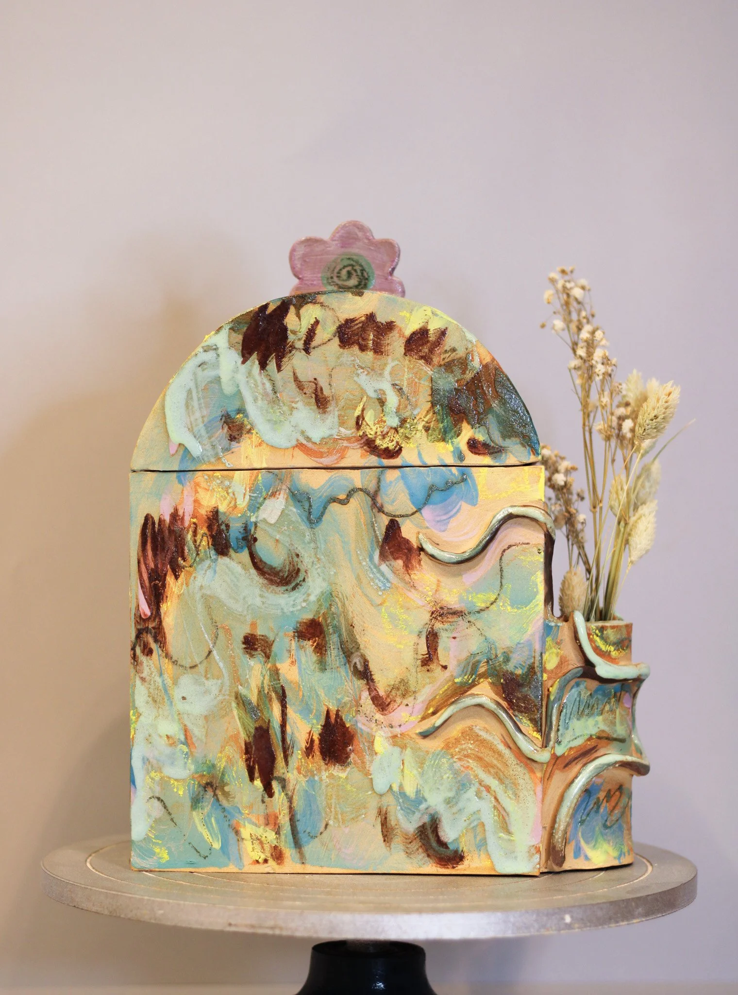 Hand-built memorial ceramic urn commissioned by a private collector, featuring a custom colour palette and an integrated space for fresh flowers.