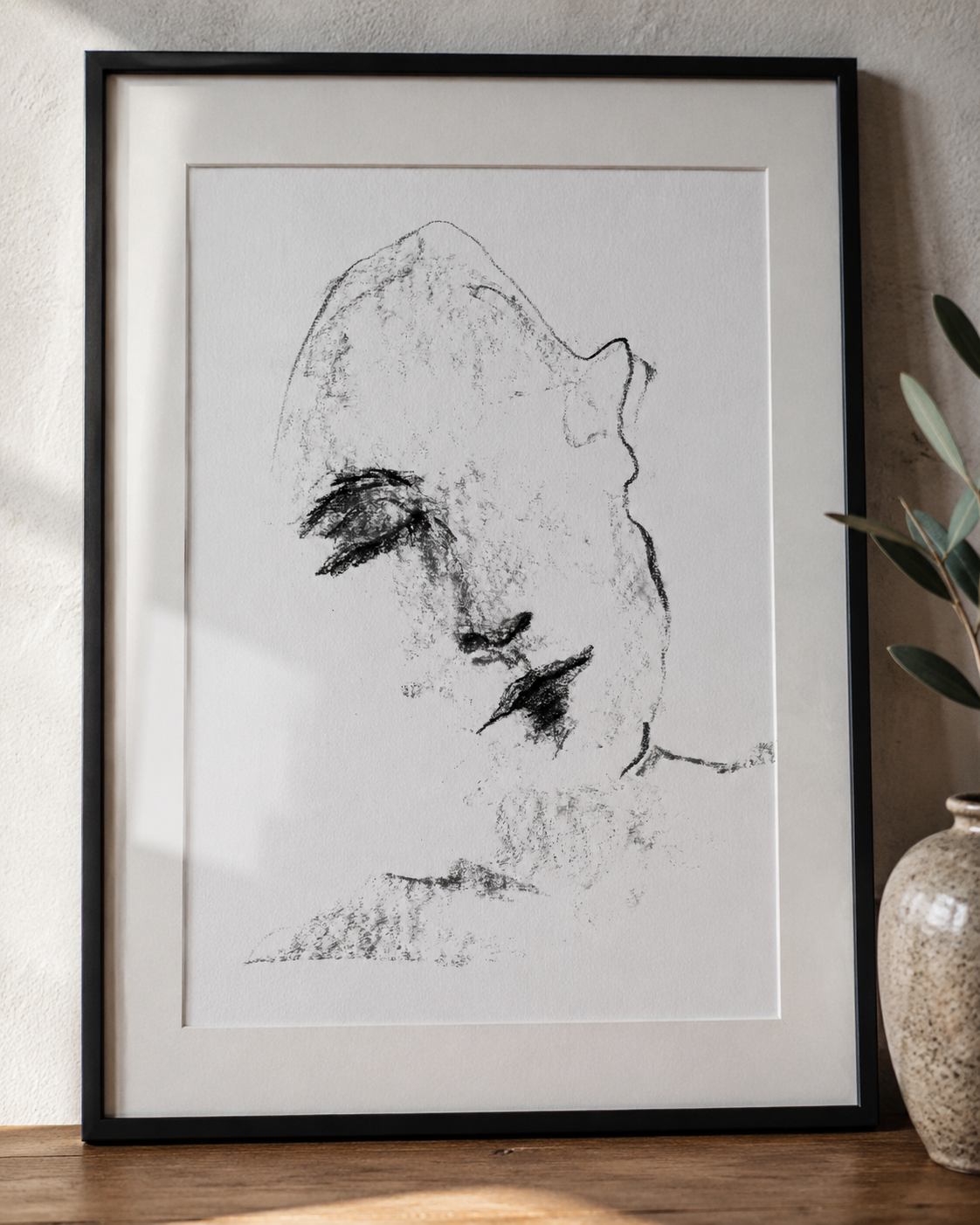 Charcoal drawing on paper exploring abstract portraiture through expressive charcoal marks and flowing organic forms.