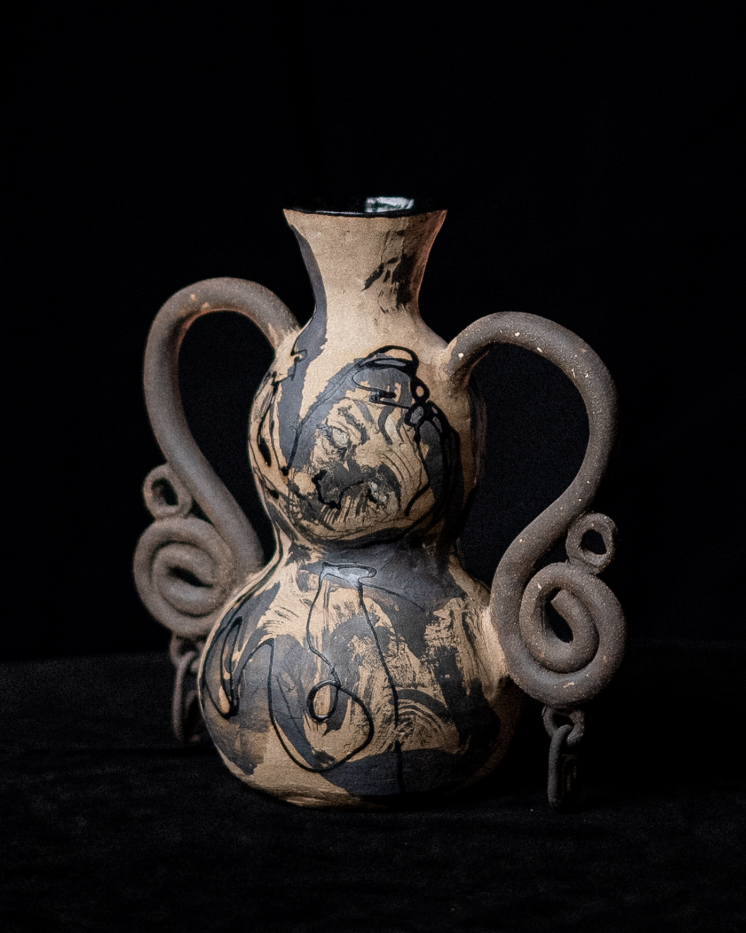 Ceramic vessel from the Marbling Dream series, featuring illustrated organic linework, curvy handles, marbled ceramic glazes and sculptural openings inspired by natural forms.
