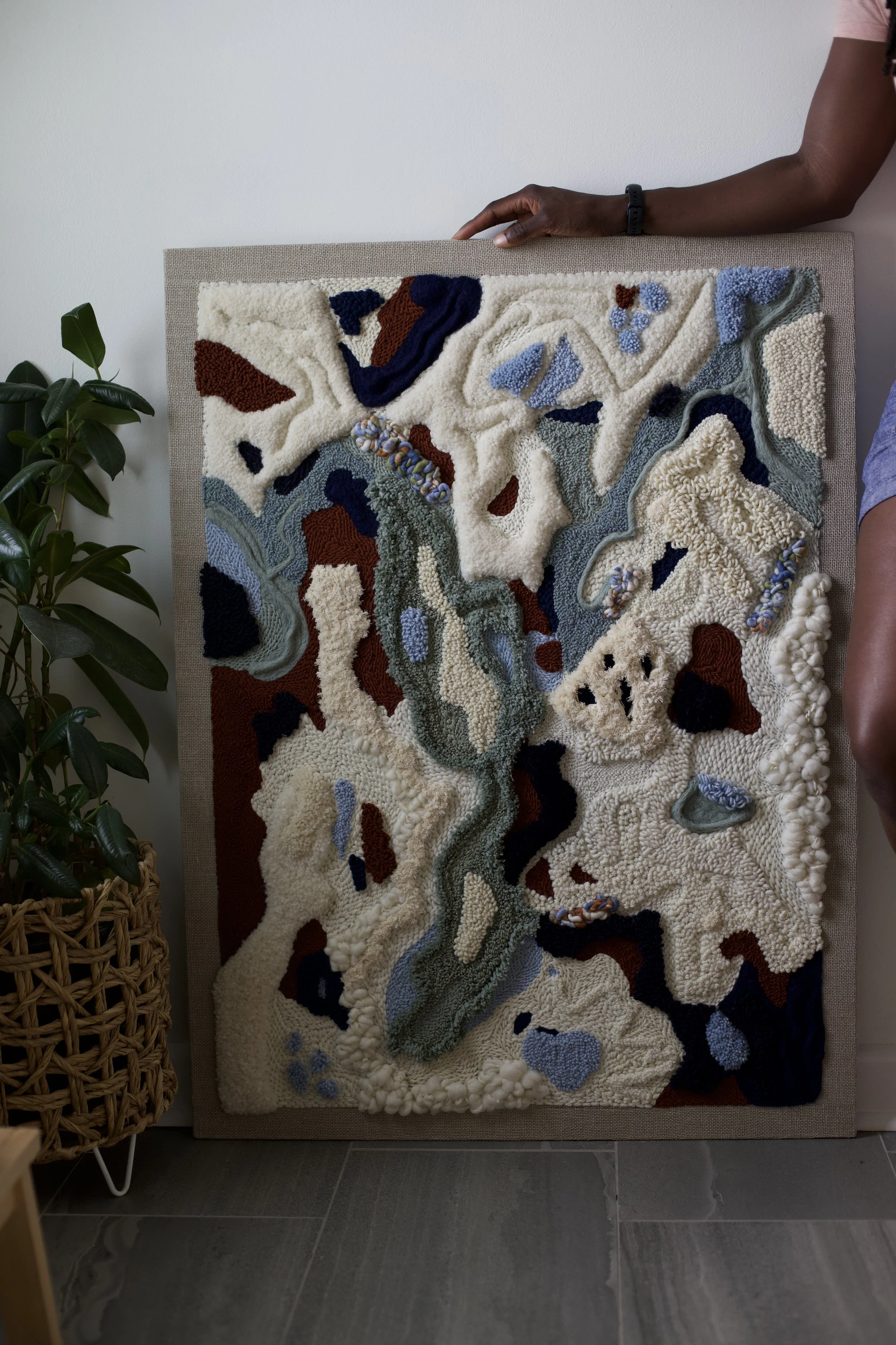 Khanyisa - “to bring light.”
Made 2025

This 30x40 piece marks a turning point for me as an artist, creating it helped me step into a clearer understanding of my own style. Made entirely from natural fibres: linen, sheep wool, alpaca wool, and cotton