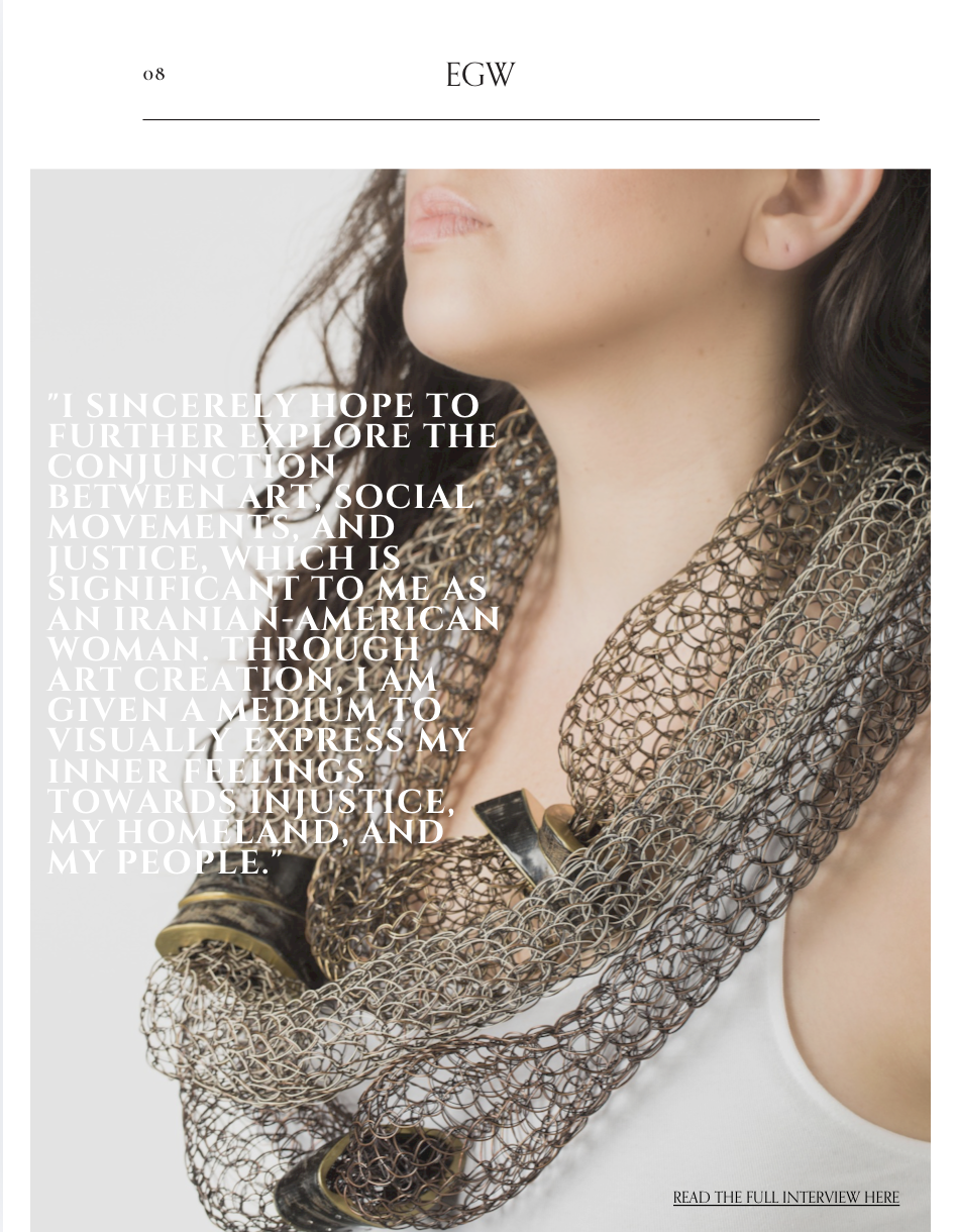Close-up of a woman's face and neck, wearing a metallic woven scarf with round metallic accents.
