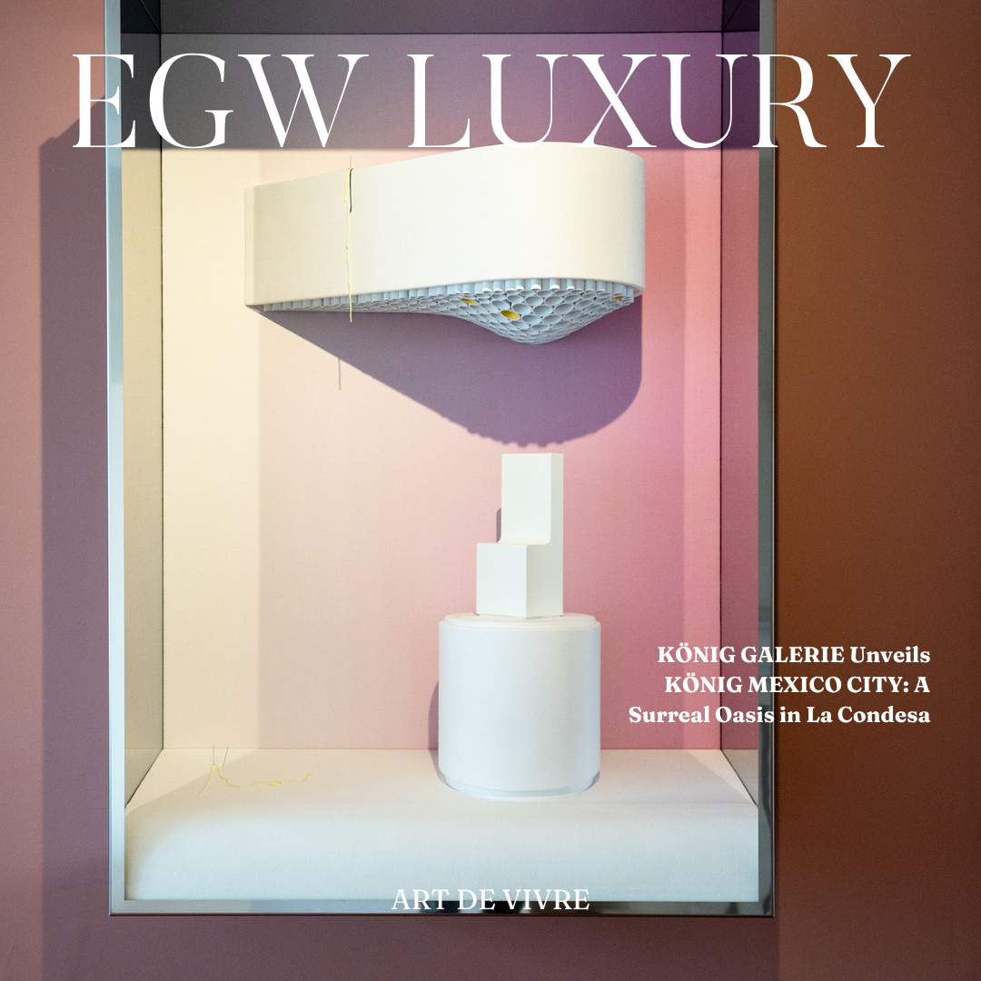 Cover of EGW LUXURY magazine featuring an art installation with white geometric shapes displayed in a glass case, pink background, and text about an art event at KÖNIG GALLERY in Mexico City.