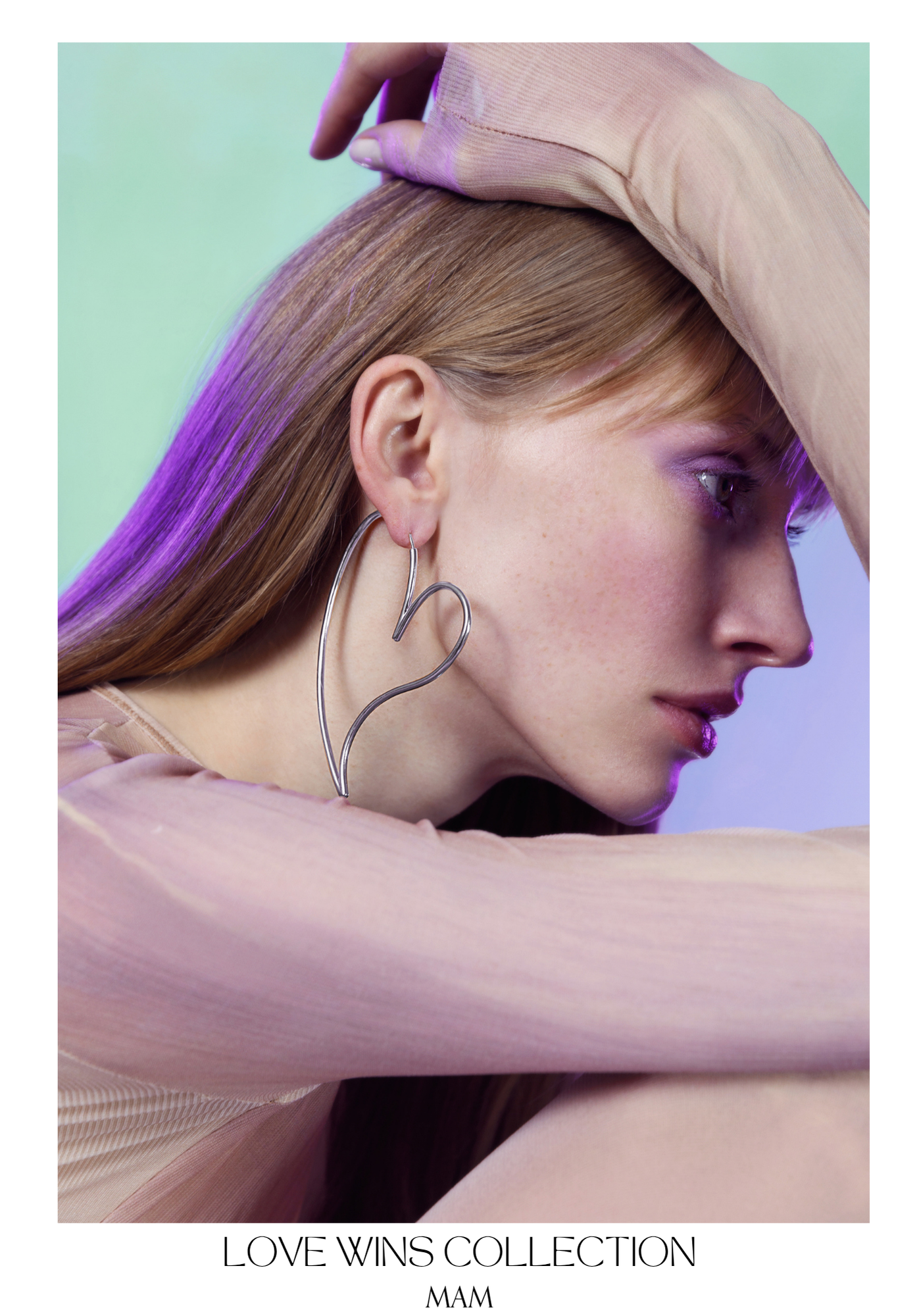 A close-up of a woman with blonde hair wearing an earring, with her hand resting on her head, and a pastel-colored background. The image features soft lighting and a calm expression.