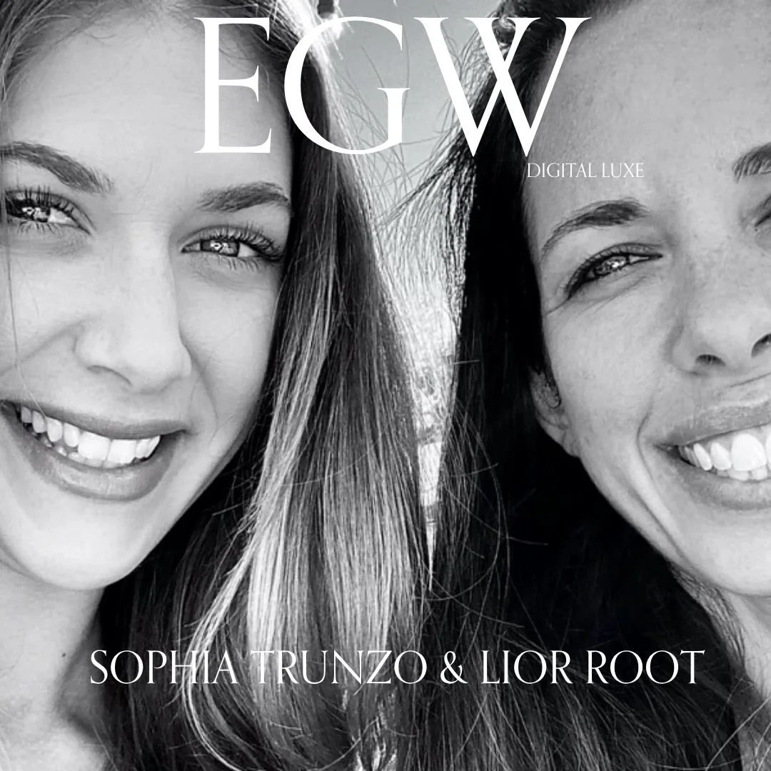 Black and white photo of two smiling women with long hair close together. The text 'EGW' and 'Digital Luxe' appears at the top, and 'SOPHIA TRUNZO & LIOR ROOT' at the bottom.