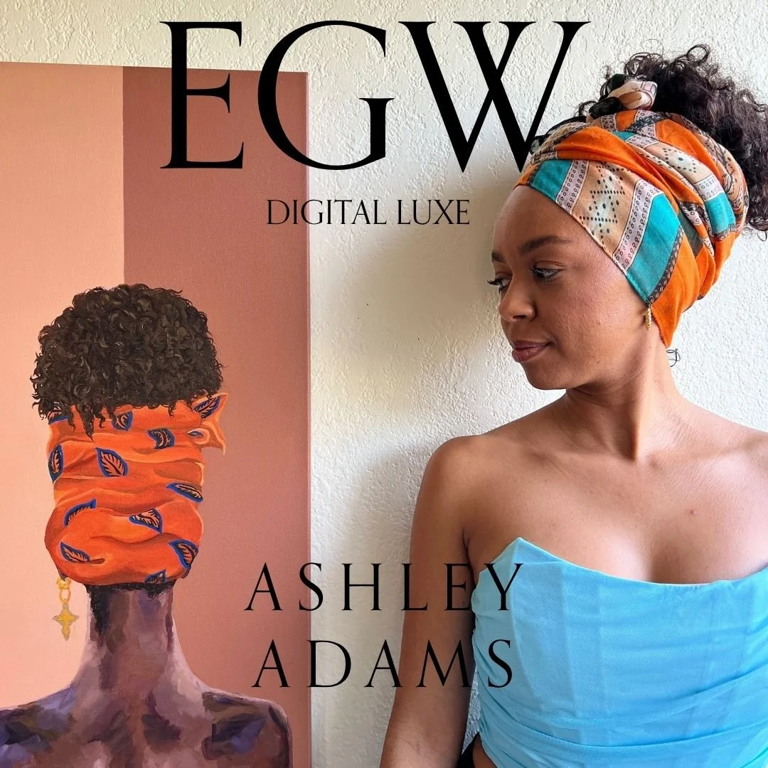 Cover of a digital magazine featuring a woman wearing a colorful headwrap, looking at a poster of an art piece of a woman with a similar headwrap. Text on the cover says "EGW DIGITAL LUXE" and "ASHLEY ADAMS."