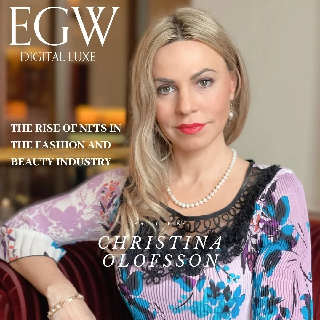 Magazine cover featuring a woman with blonde hair wearing a floral top, pearl necklace, and earrings, sitting on a velvet chair. Text on the cover includes 'EGW DIGITAL LUXE,' 'The Rise of NFTs in the Fashion and Beauty Industry,' and 'Article by Chr