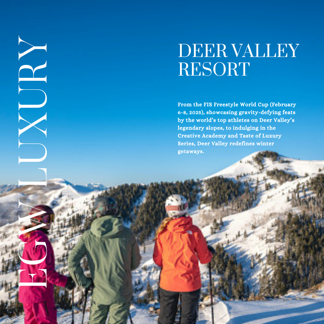 Three snowboarders in winter gear looking at Snow-covered mountains and pine trees at Deer Valley Resort during daytime.